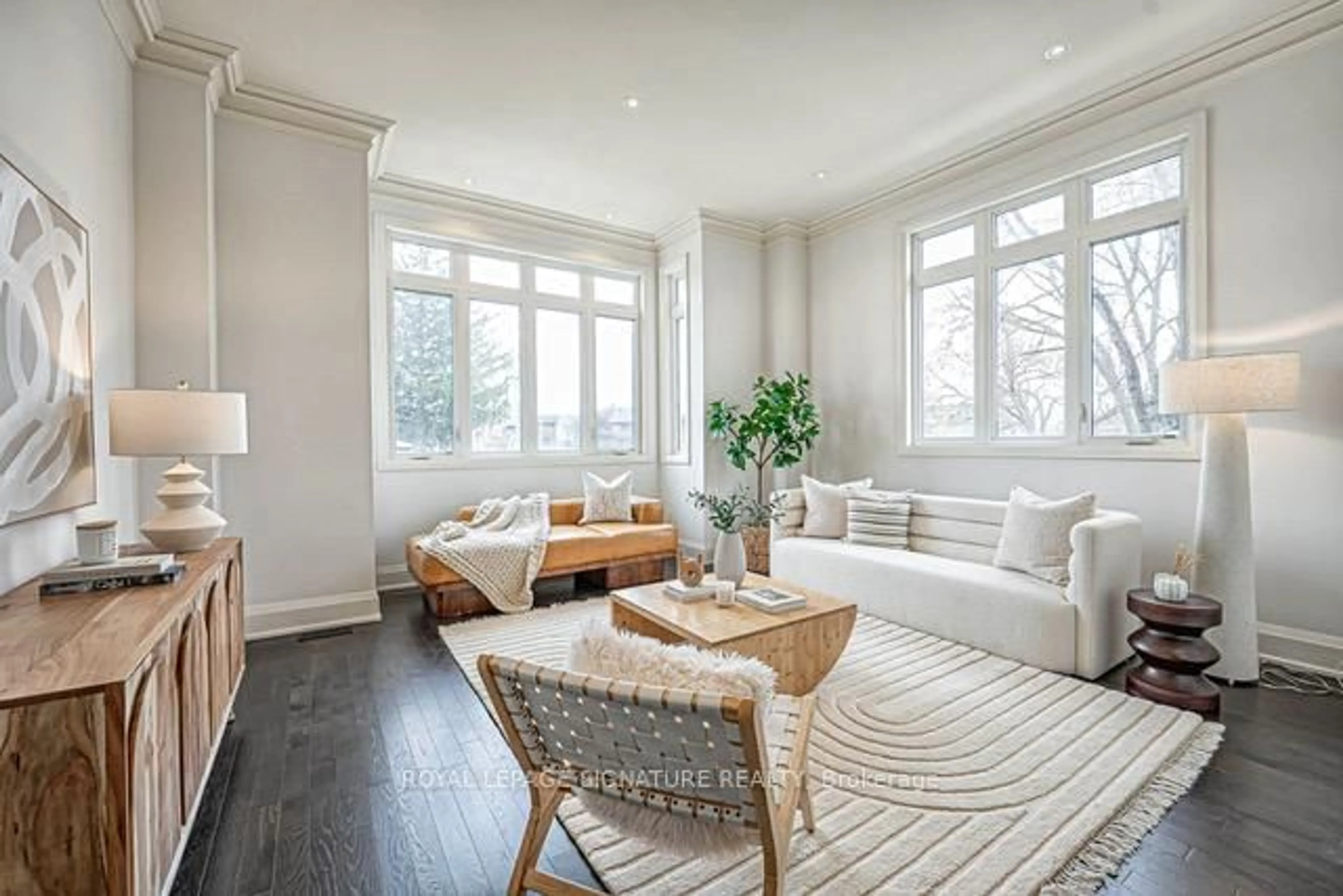 Living room with furniture, wood/laminate floor for 28 Elder Ave, Toronto Ontario M8W 1S4