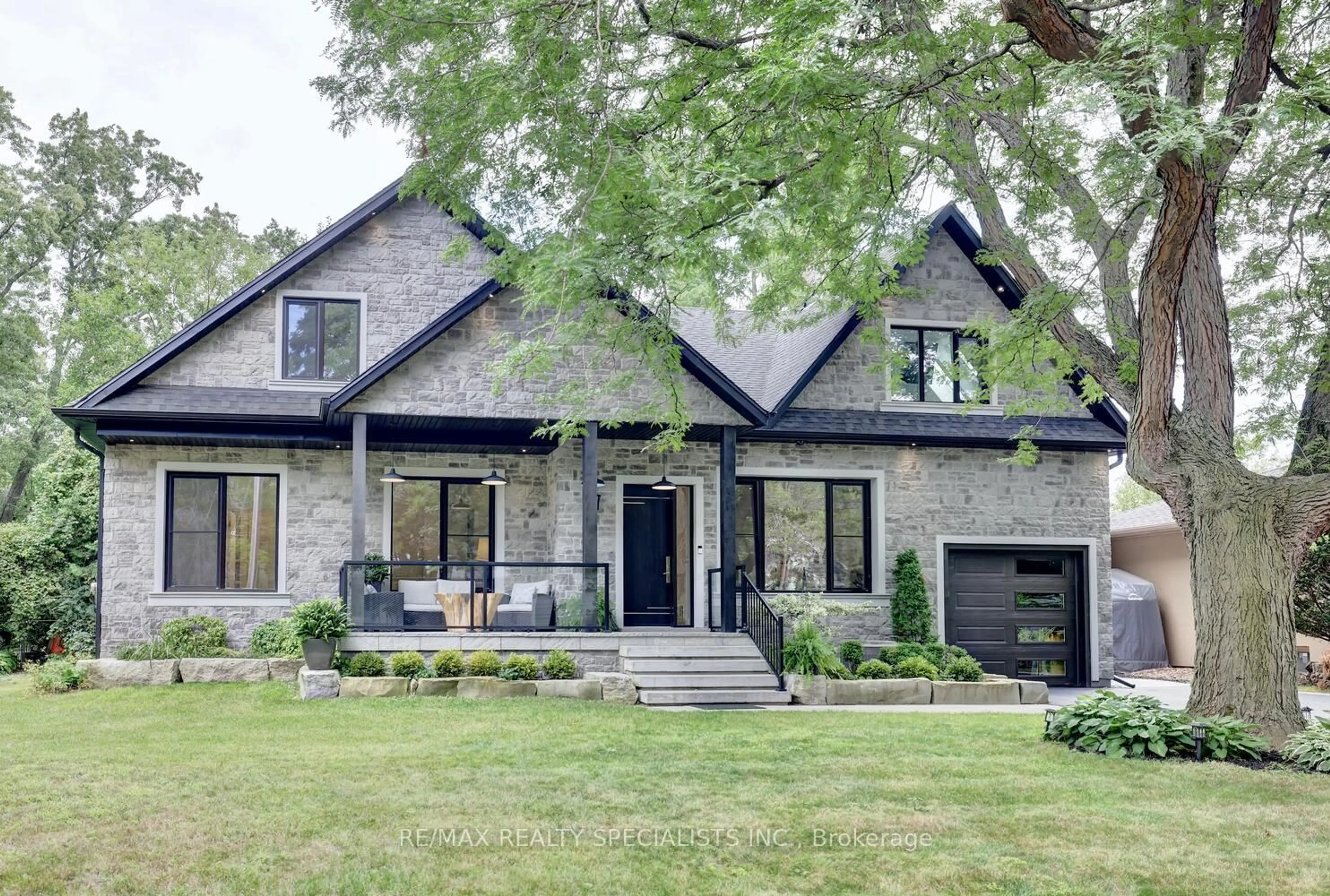 Home with brick exterior material, street for 1310 Martley Dr, Mississauga Ontario L5H 1N9