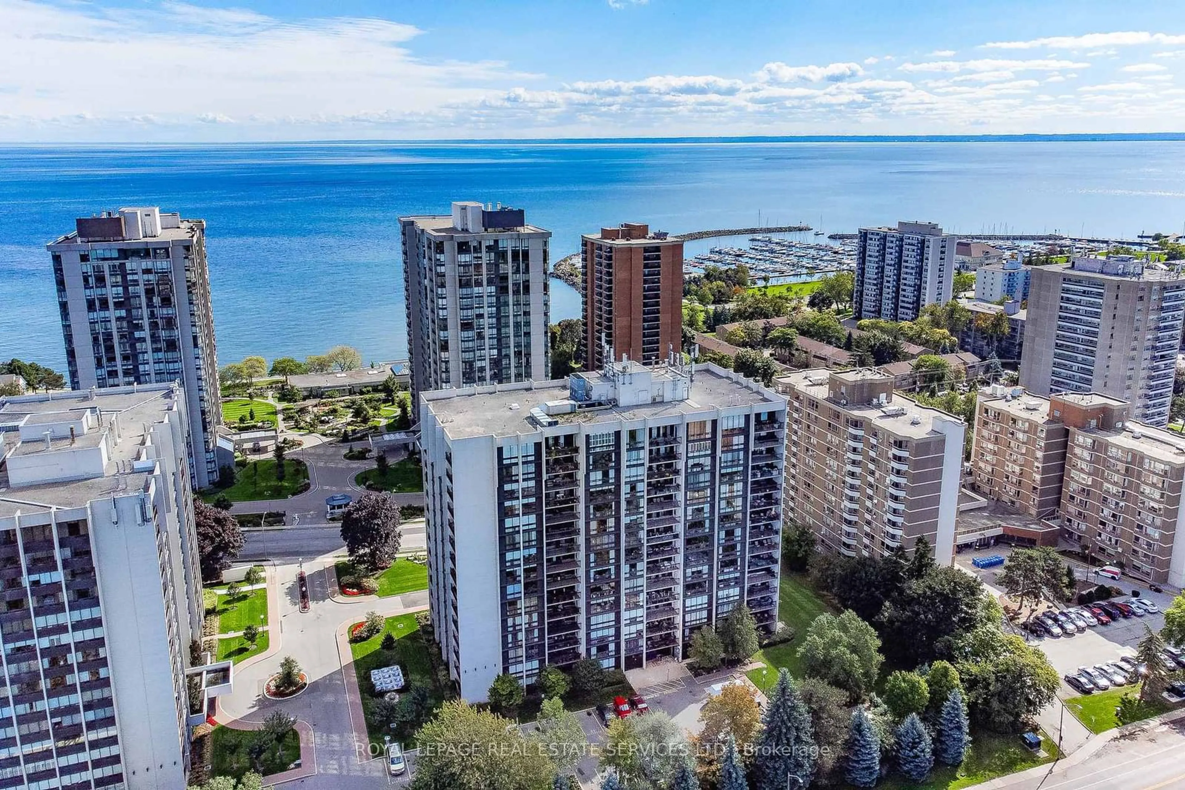 A pic from outside/outdoor area/front of a property/back of a property/a pic from drone, water/lake/river/ocean view for 2185 Marine Dr #708, Oakville Ontario L6L 5L6