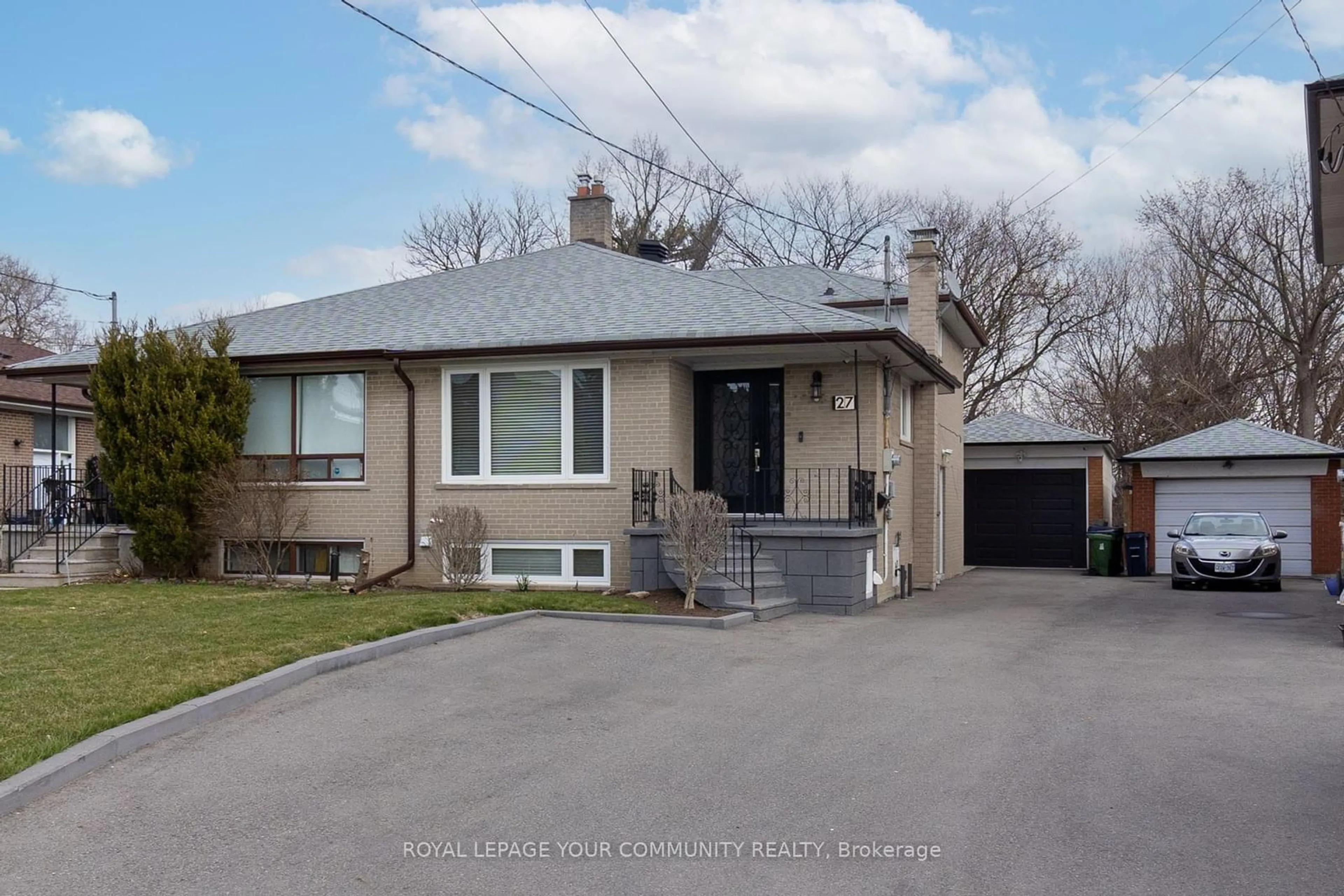 Home with brick exterior material, street for 27 Newlin Cres, Toronto Ontario M3L 1X5