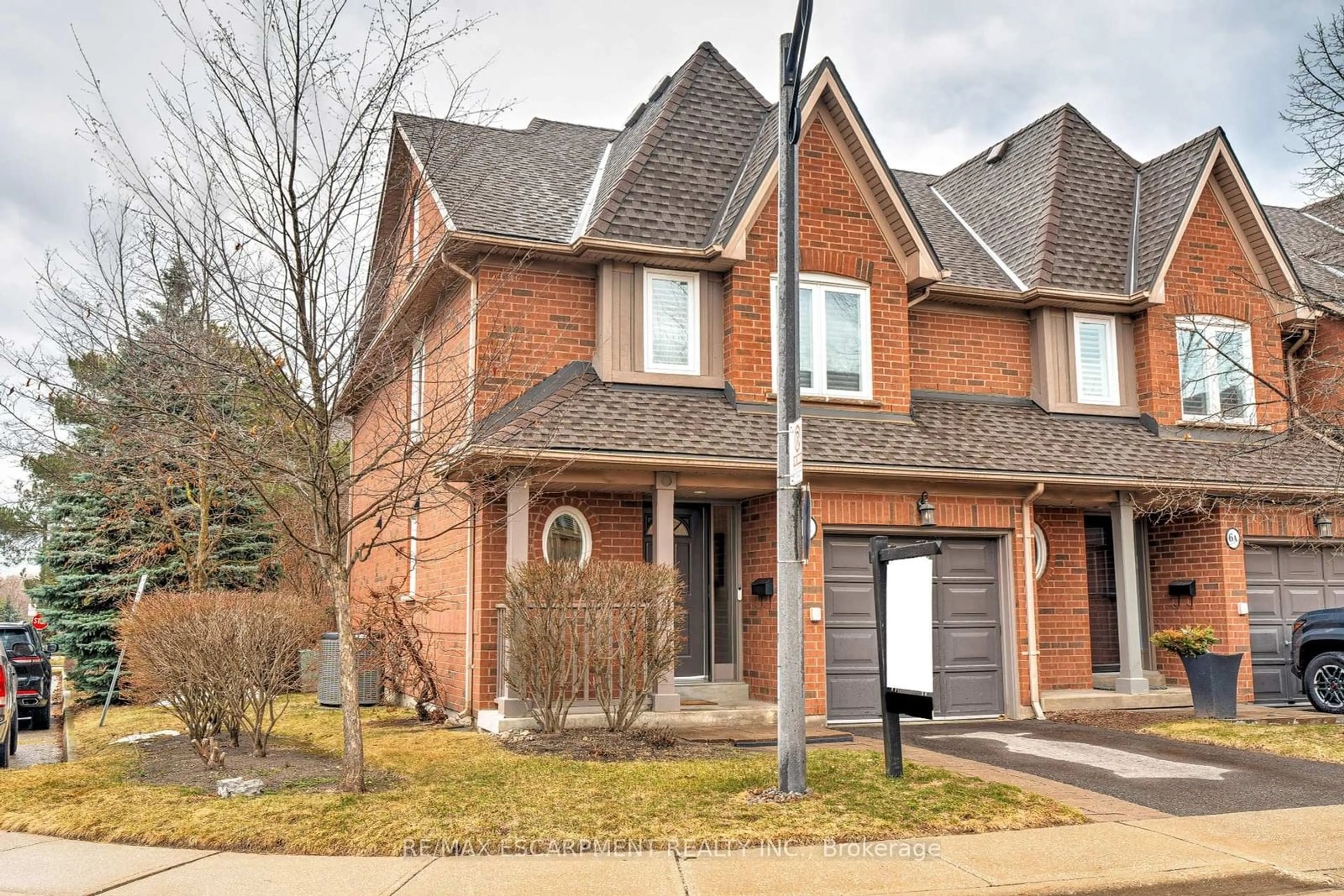 Home with brick exterior material, street for 1064 Queen St #7A, Mississauga Ontario L5H 4K3