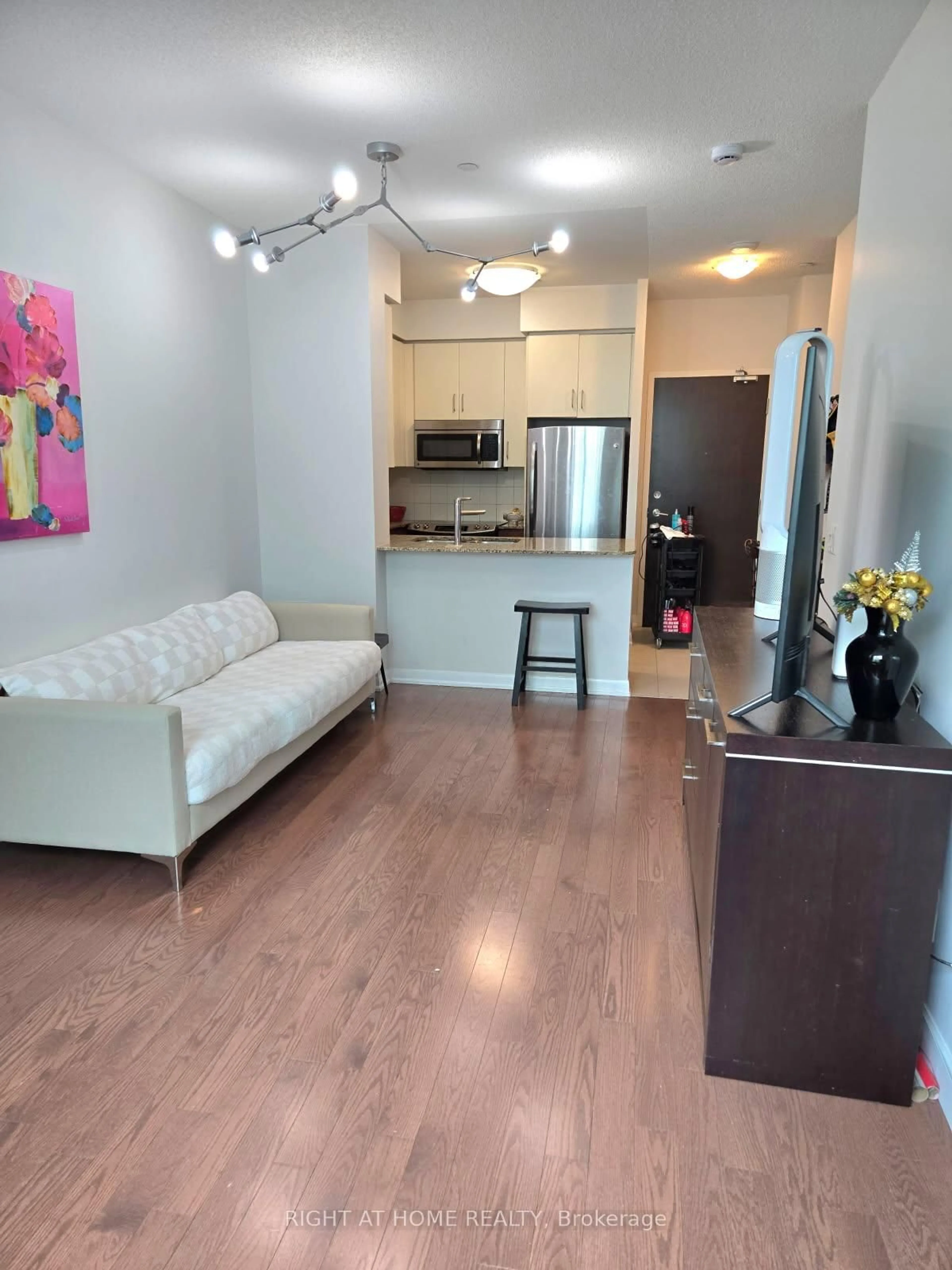 Living room with furniture, unknown for 215 Sherway Gardens Rd #101, Toronto Ontario M9C 0A4