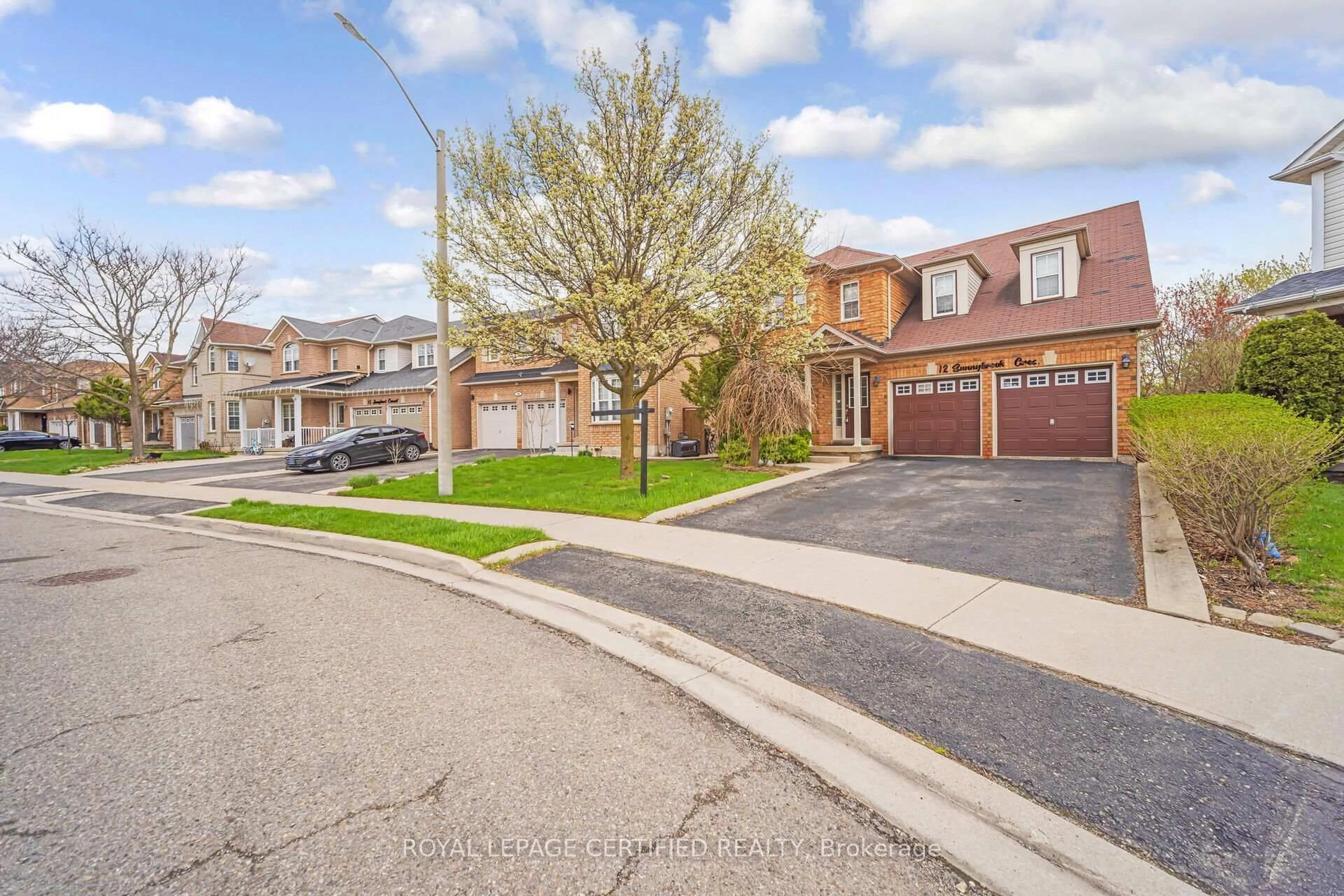A pic from outside/outdoor area/front of a property/back of a property/a pic from drone, street for 12 Sunnybrook Cres, Brampton Ontario L7A 1Y2