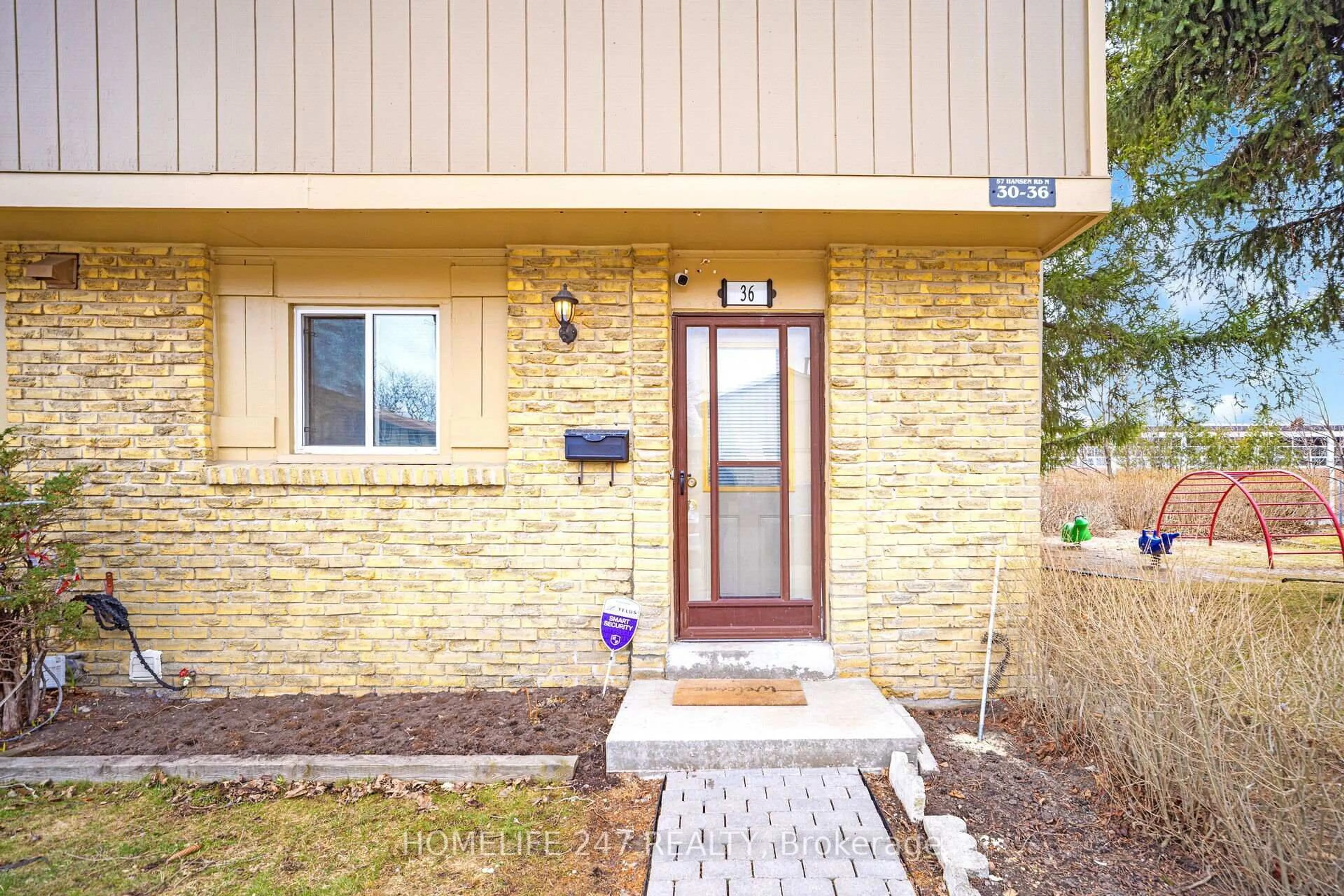 Home with brick exterior material, street for 57 Hansen Rd #36, Brampton Ontario L6V 3C6