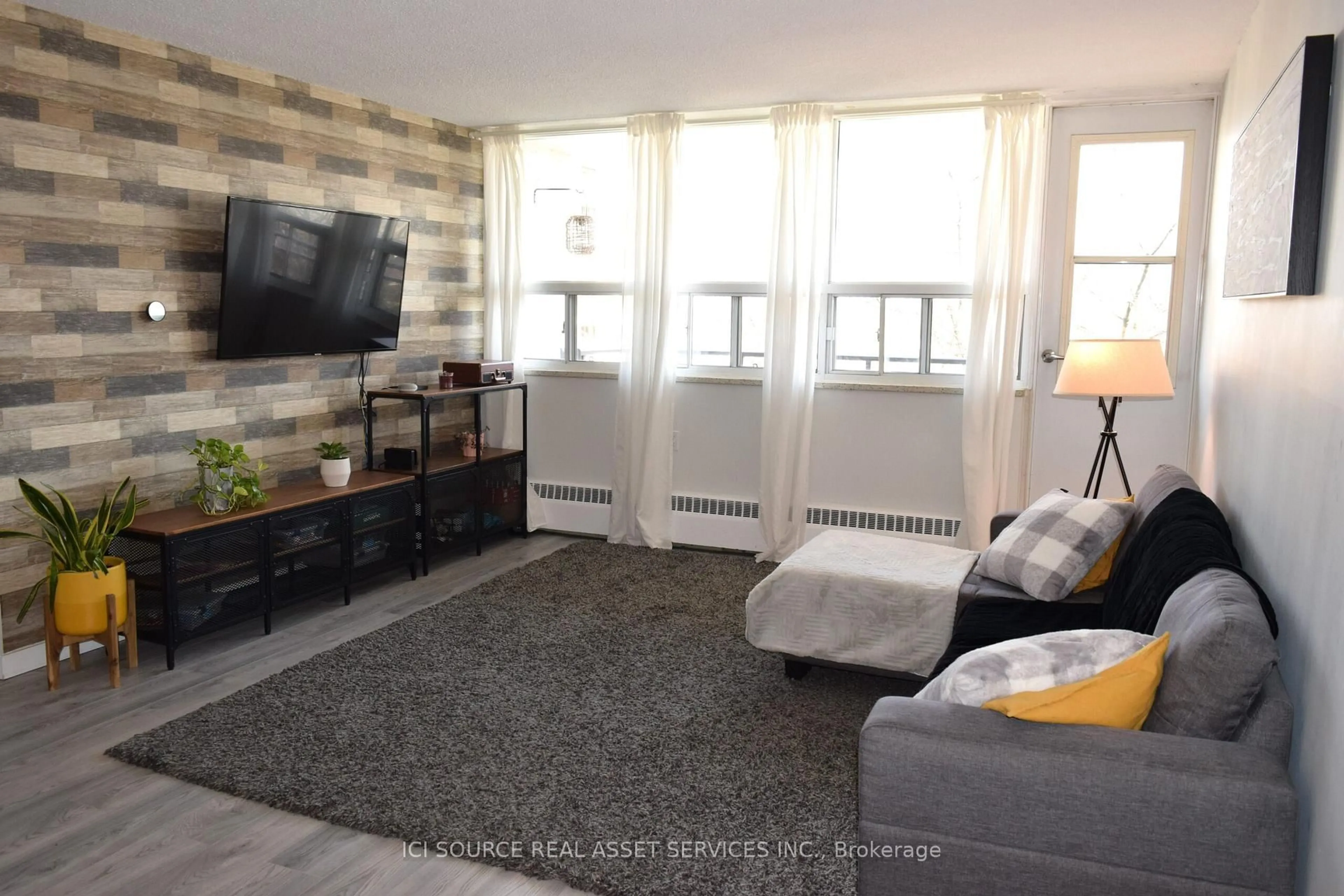 Living room with furniture, unknown for 212 Kerr St #601, Oakville Ontario L6K 3B1