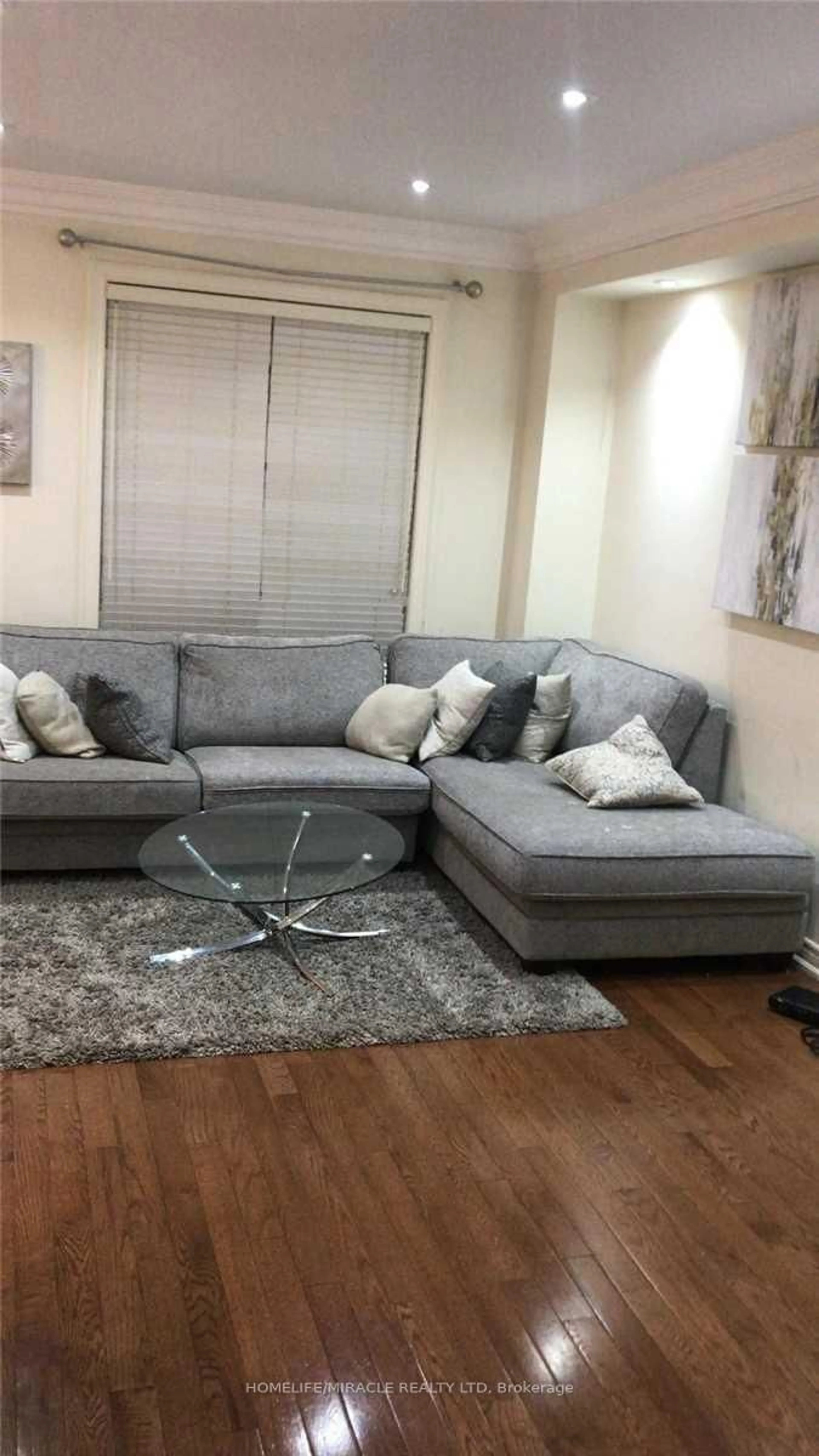 Living room with furniture, unknown for 28 Sussexvale Dr, Brampton Ontario L6R 3S1