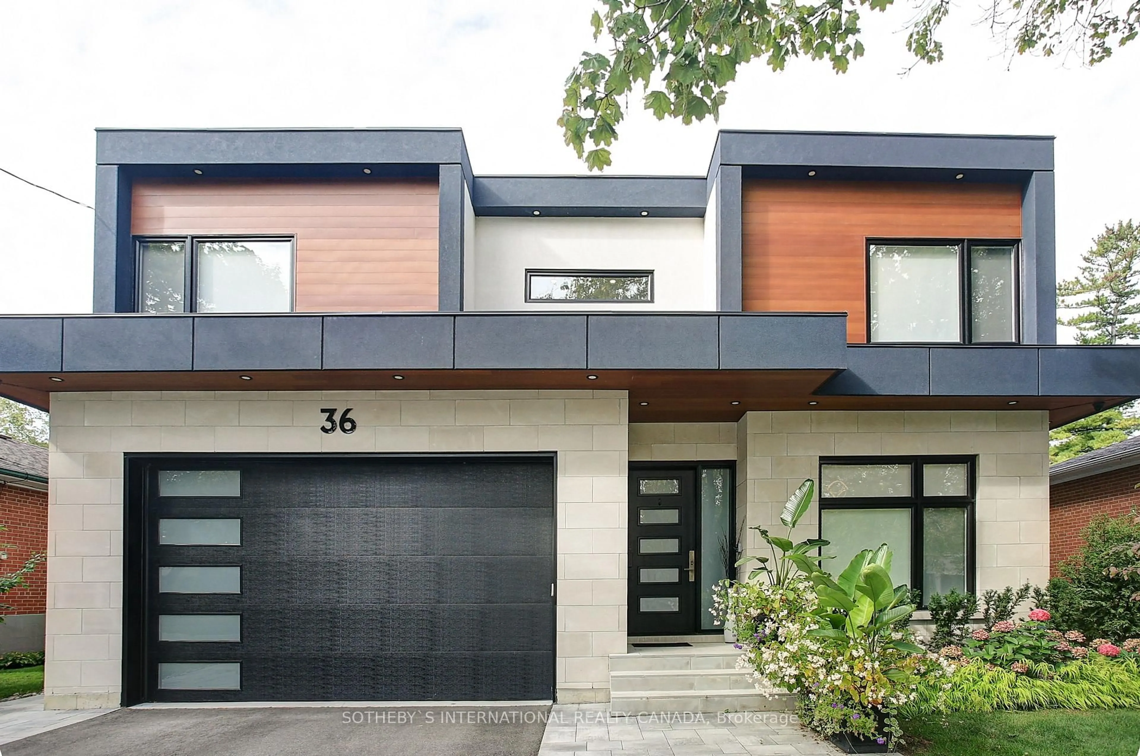 Home with brick exterior material, street for 36 Burrows Ave, Toronto Ontario M9B 4W7