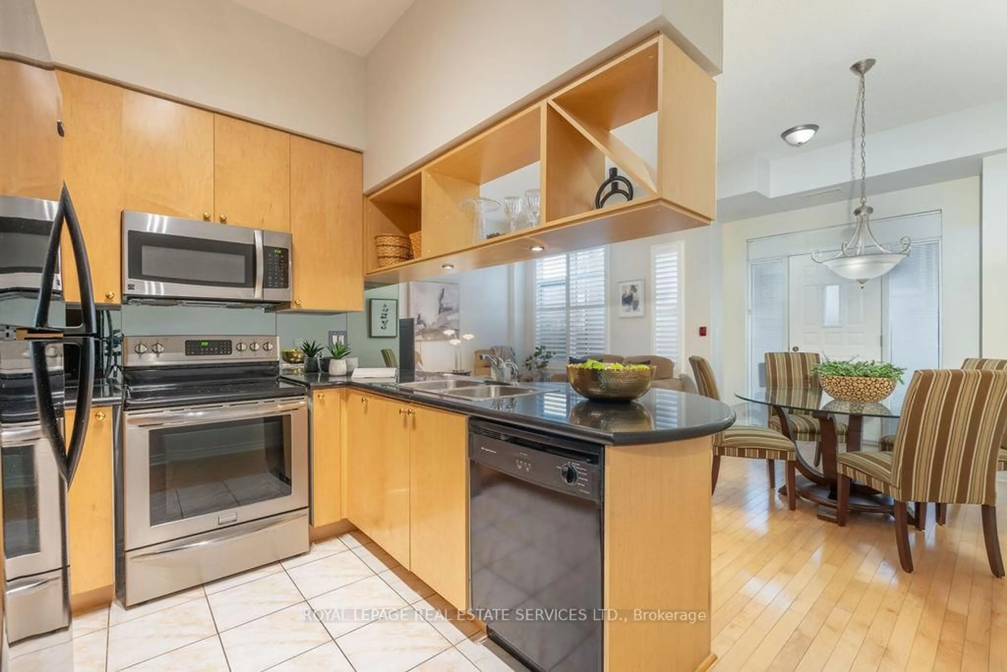 Open concept kitchen, ceramic/tile floor for 320 City Centre Dr #104, Mississauga Ontario L5B 4P8