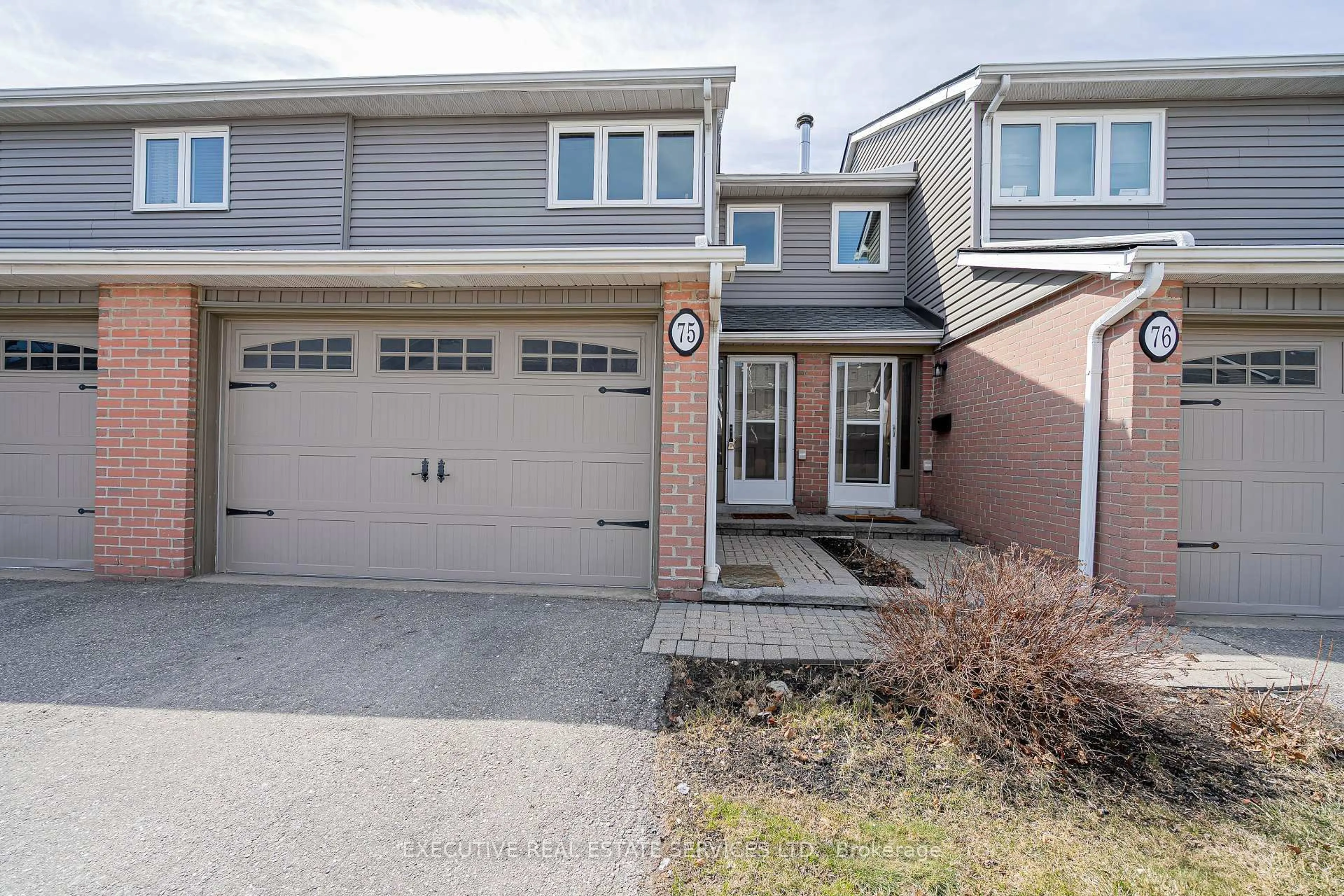 Home with brick exterior material, street for 3125 Fifth Line Rd #75, Mississauga Ontario L5L 3S8