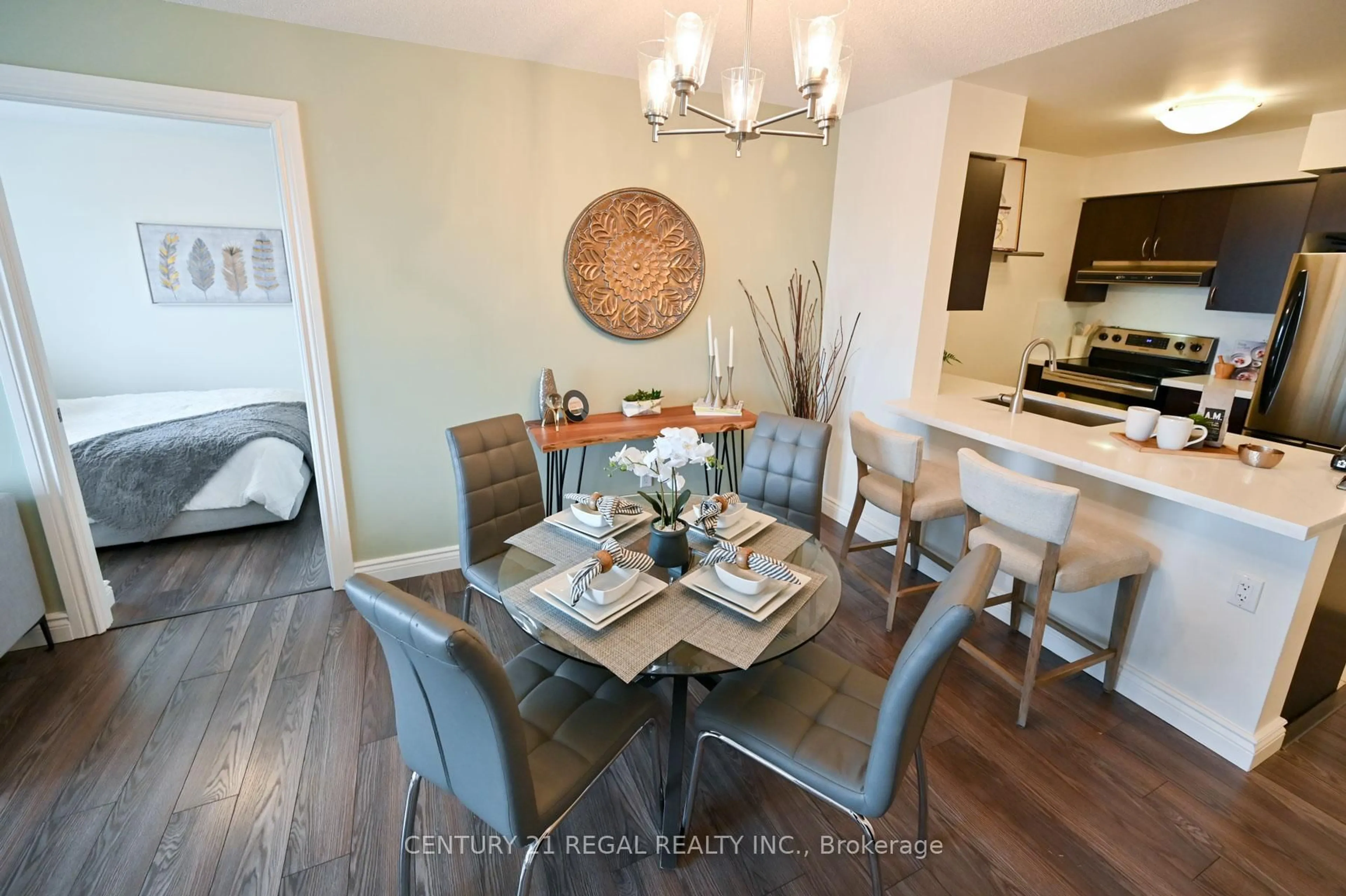 Dining room, wood/laminate floor for 60 Heintzman St #2003, Toronto Ontario M6P 5A1