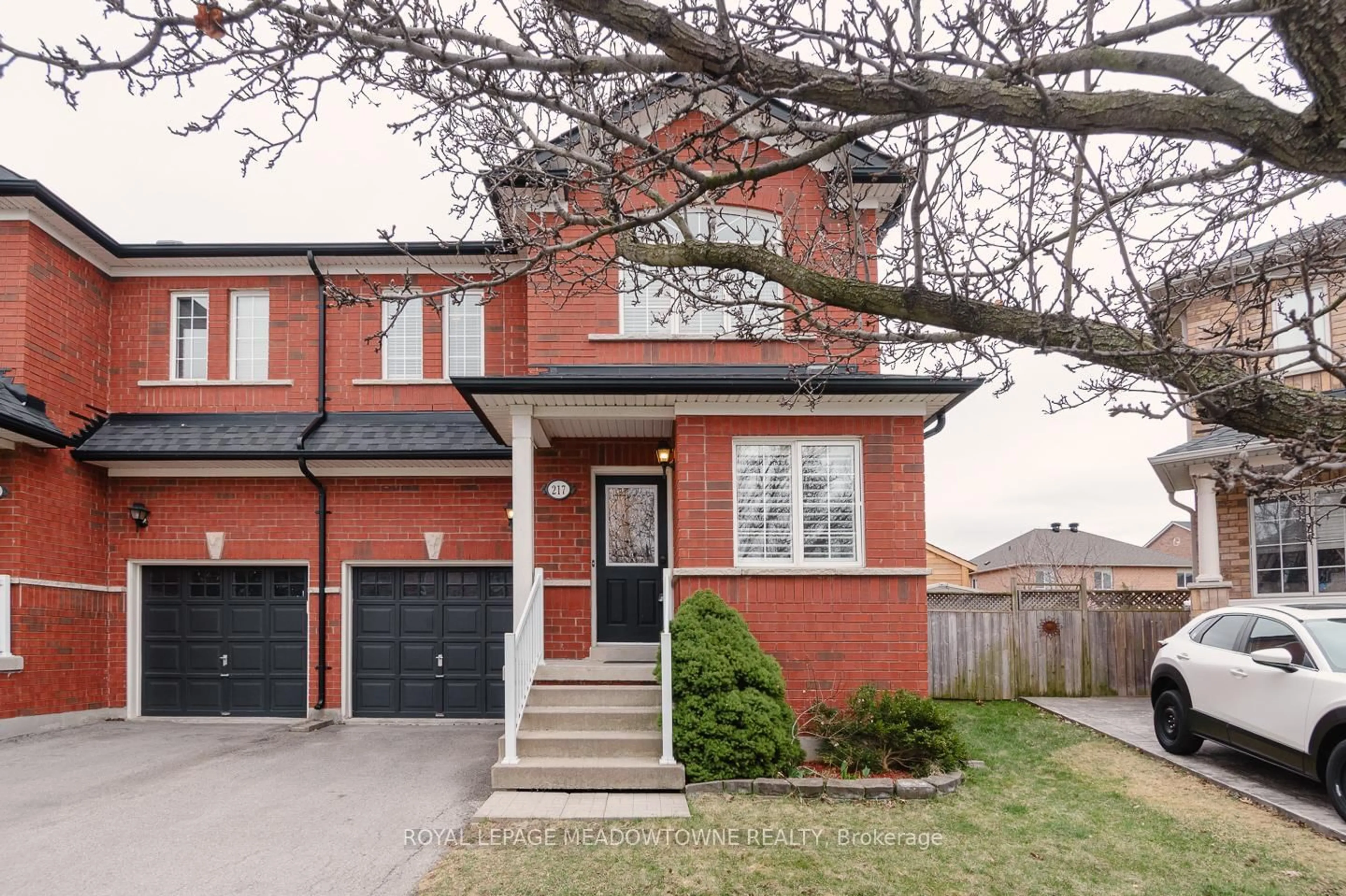 Home with brick exterior material, street for 217 Fitzgerald Cres, Milton Ontario L9T 5Y5