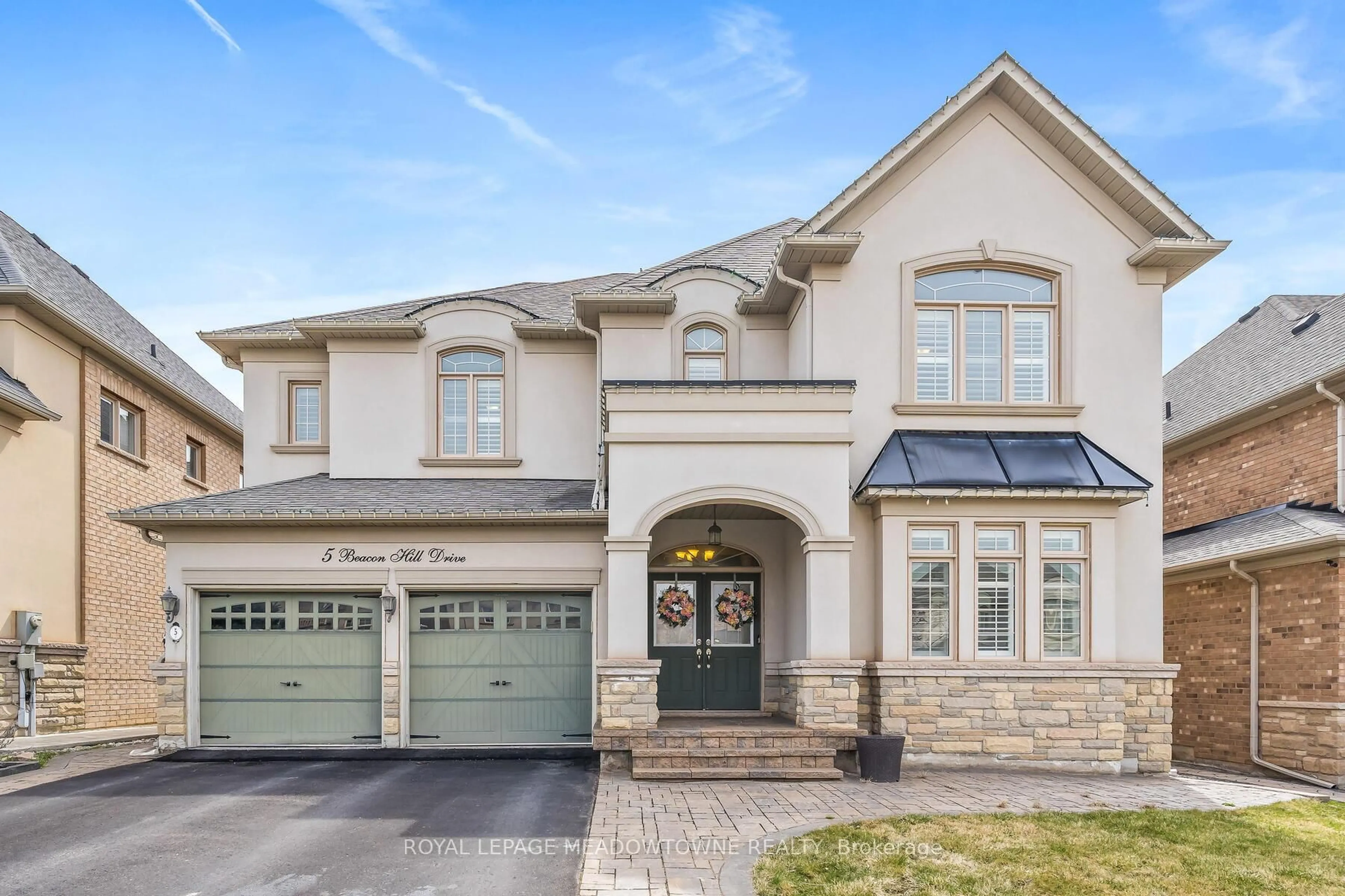 Home with brick exterior material, street for 5 Beacon Hill Dr, Brampton Ontario L6X 0V6