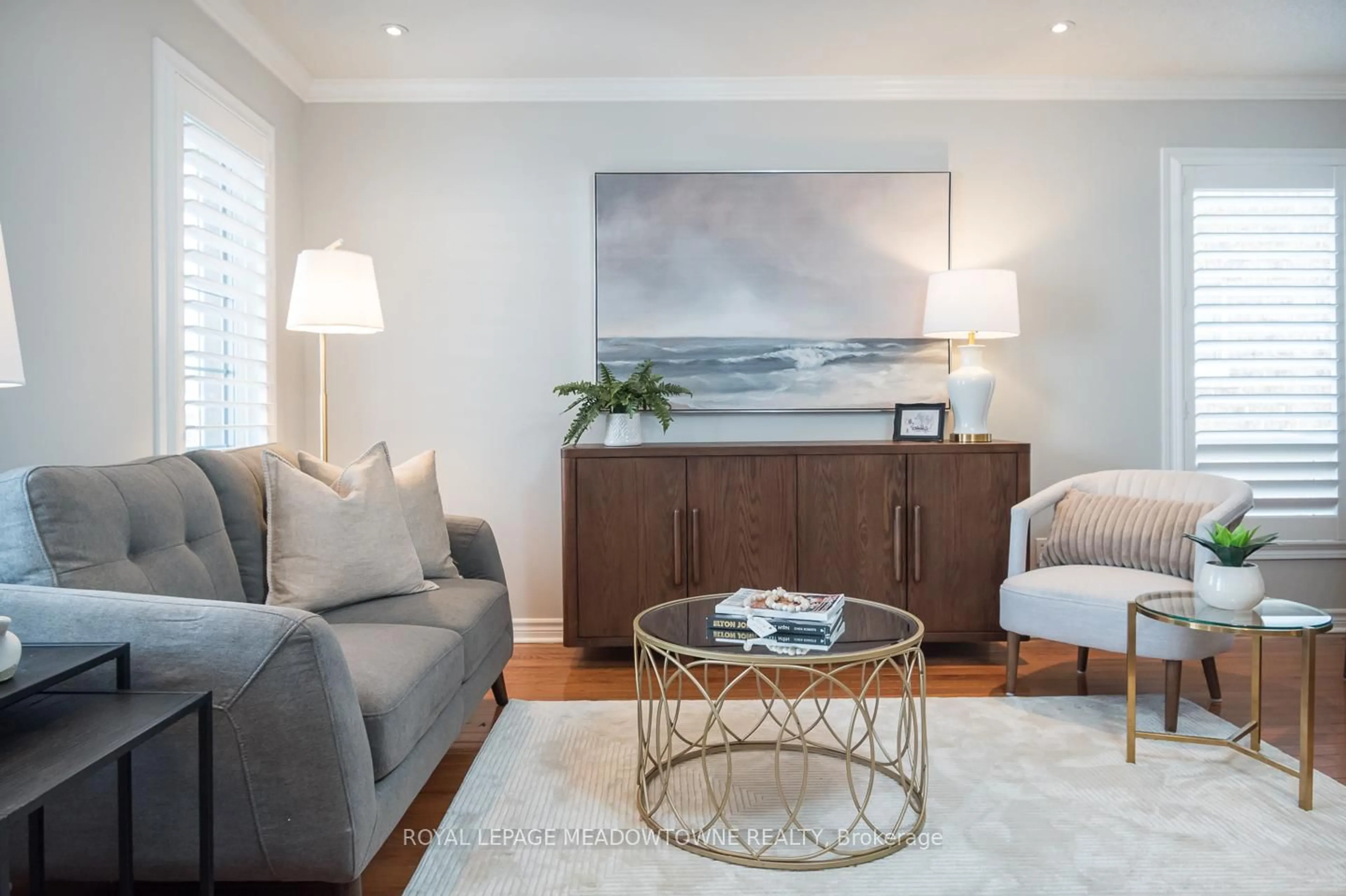 Living room with furniture, wood/laminate floor for 488 Trudeau Dr, Milton Ontario L9T 5K1