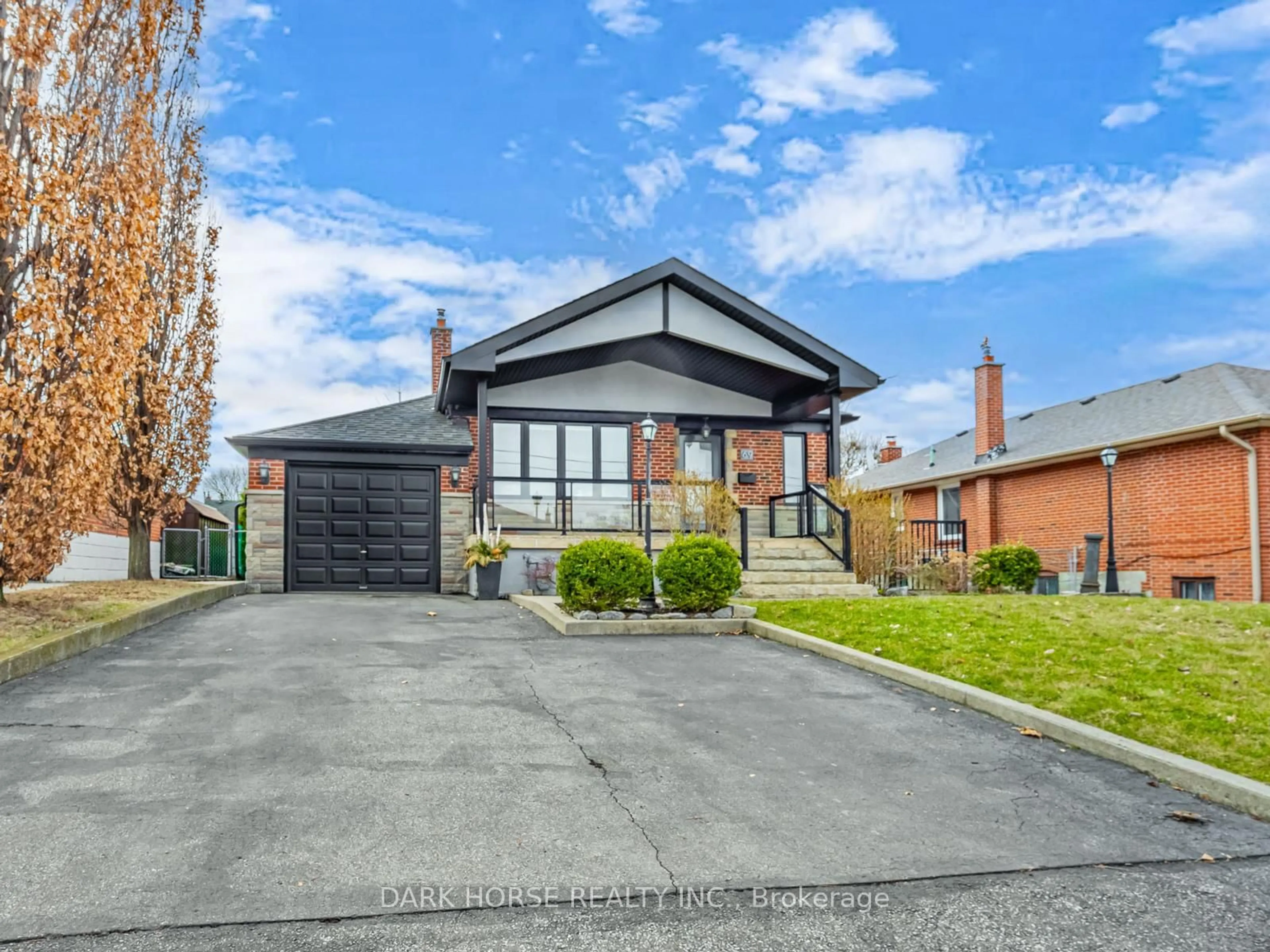 Home with brick exterior material, street for 69 Tavistock Rd, Toronto Ontario M3M 2N8