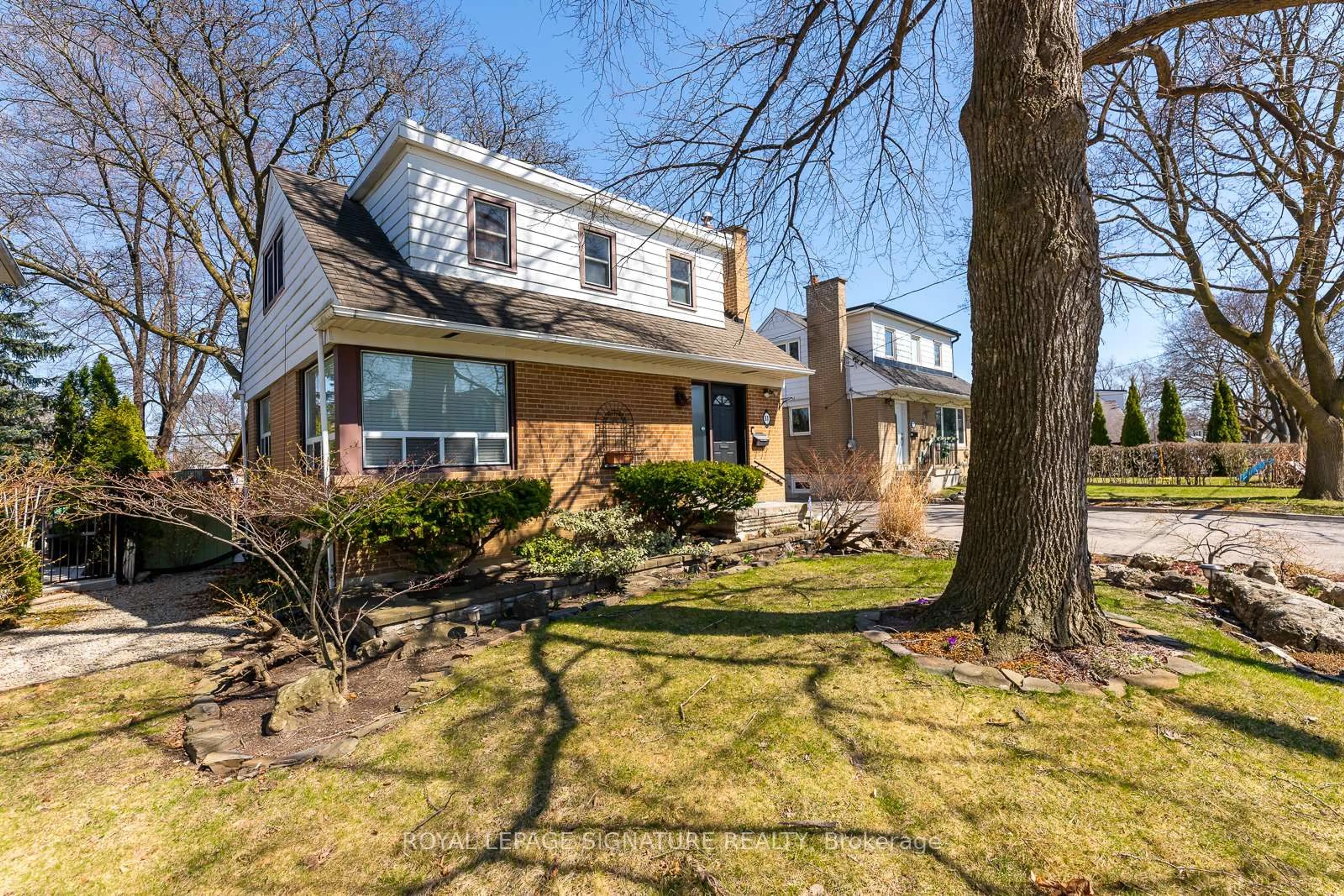 Home with brick exterior material, street for 11 Coppermill Dr, Toronto Ontario M9W 3Z1