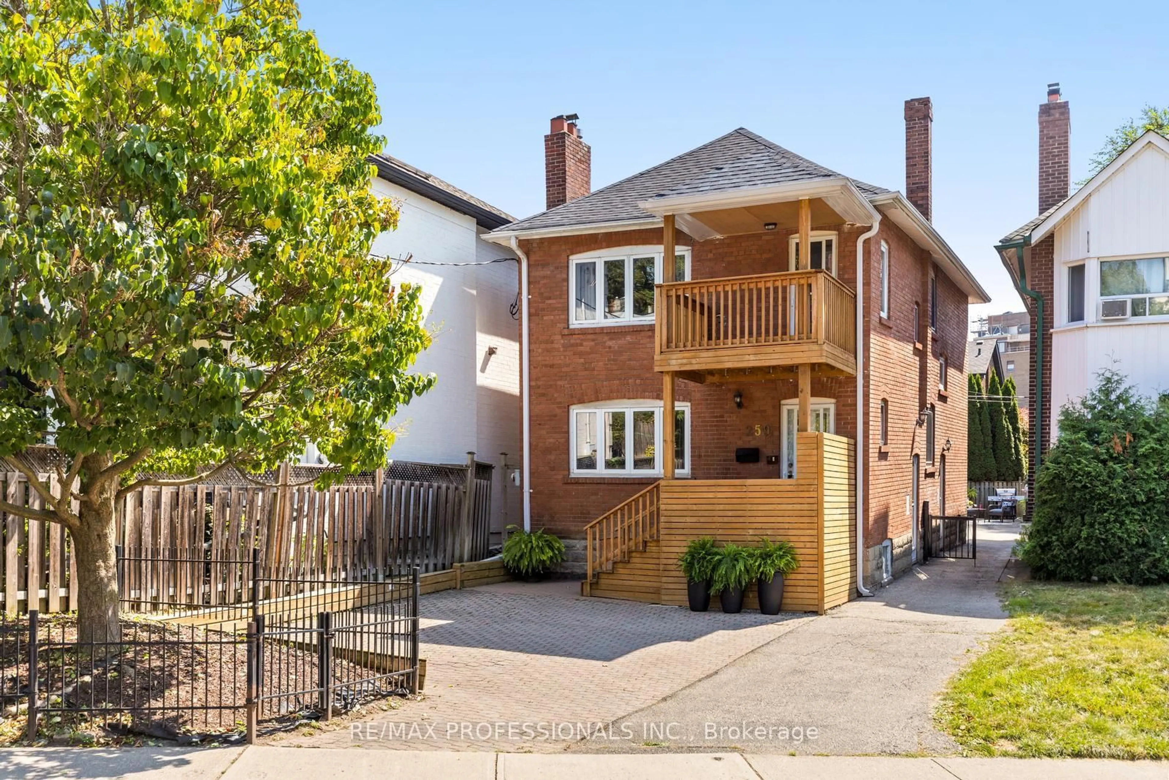 Home with brick exterior material, street for 259 Garden Ave, Toronto Ontario M6R 1J4