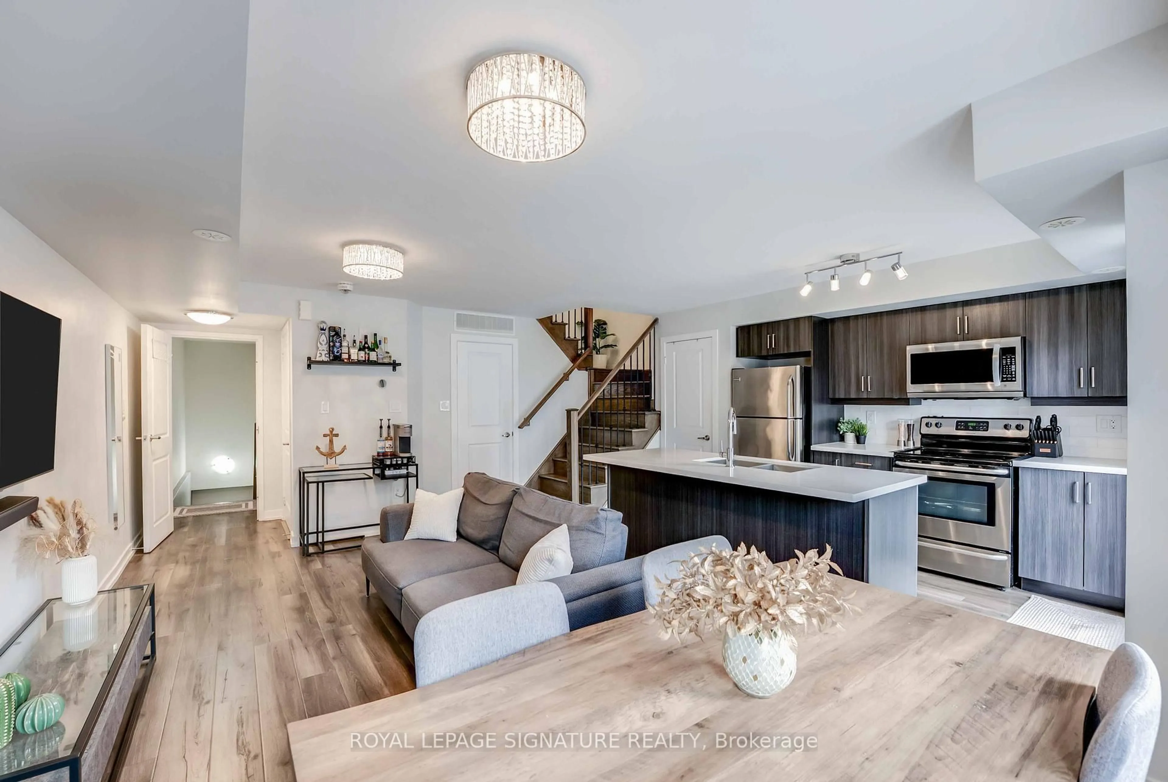 Open concept kitchen, wood/laminate floor for 2315 Sheppard Ave #50, Toronto Ontario M9M 0E8