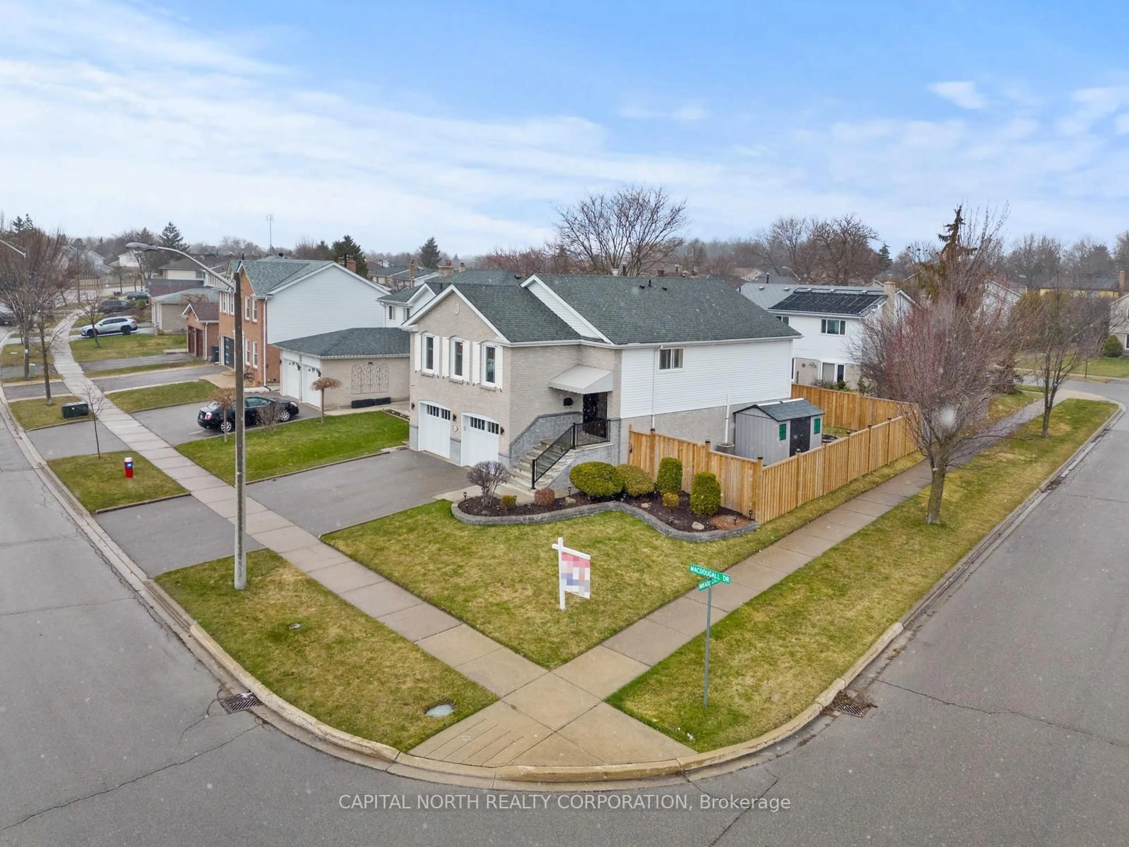 A pic from outside/outdoor area/front of a property/back of a property/a pic from drone, street for 38 Macdougall Dr, Brampton Ontario L6S 3P5