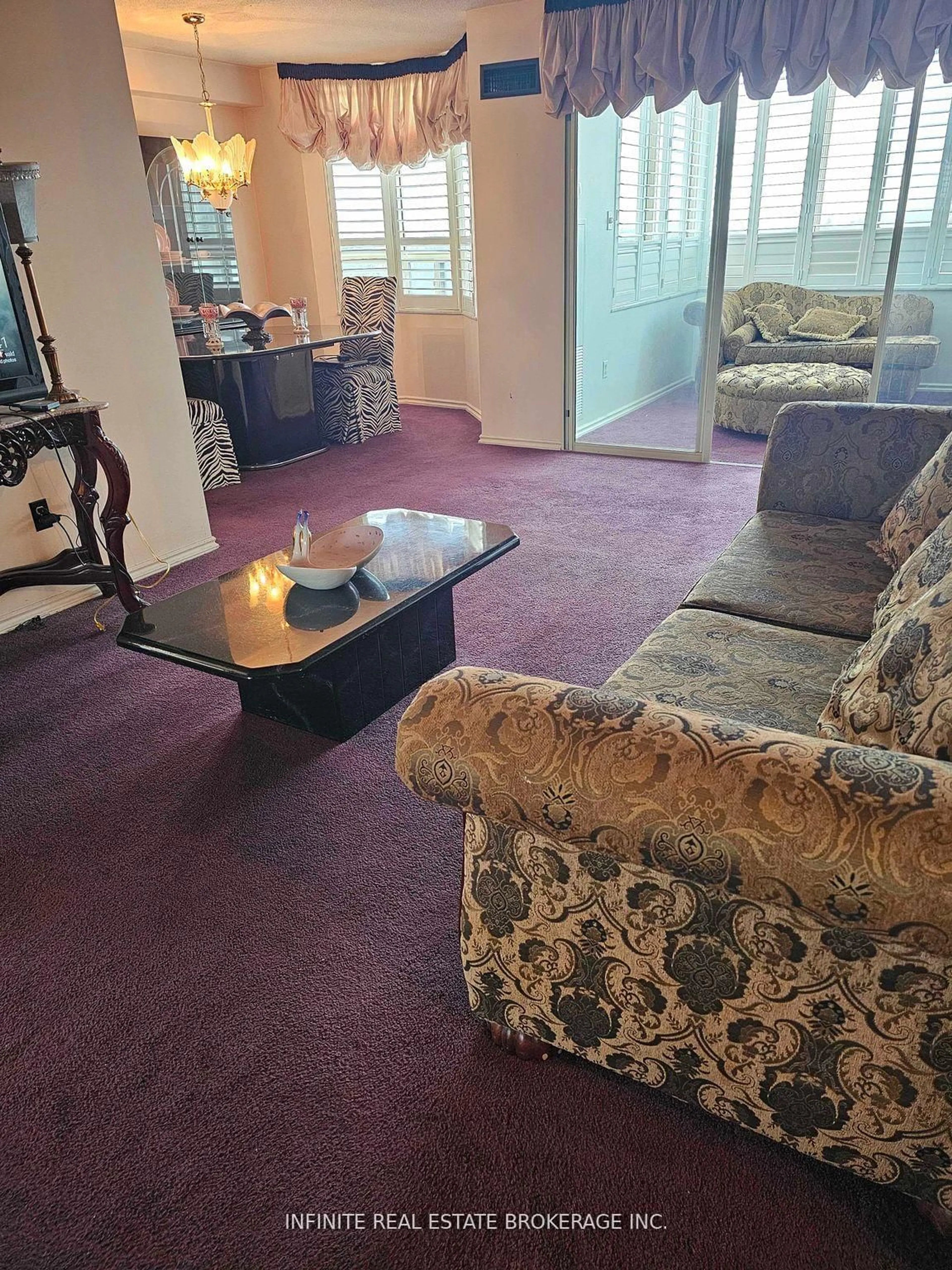 Living room with furniture, unknown for 100 County Court Blvd #409, Brampton Ontario L6W 3X1