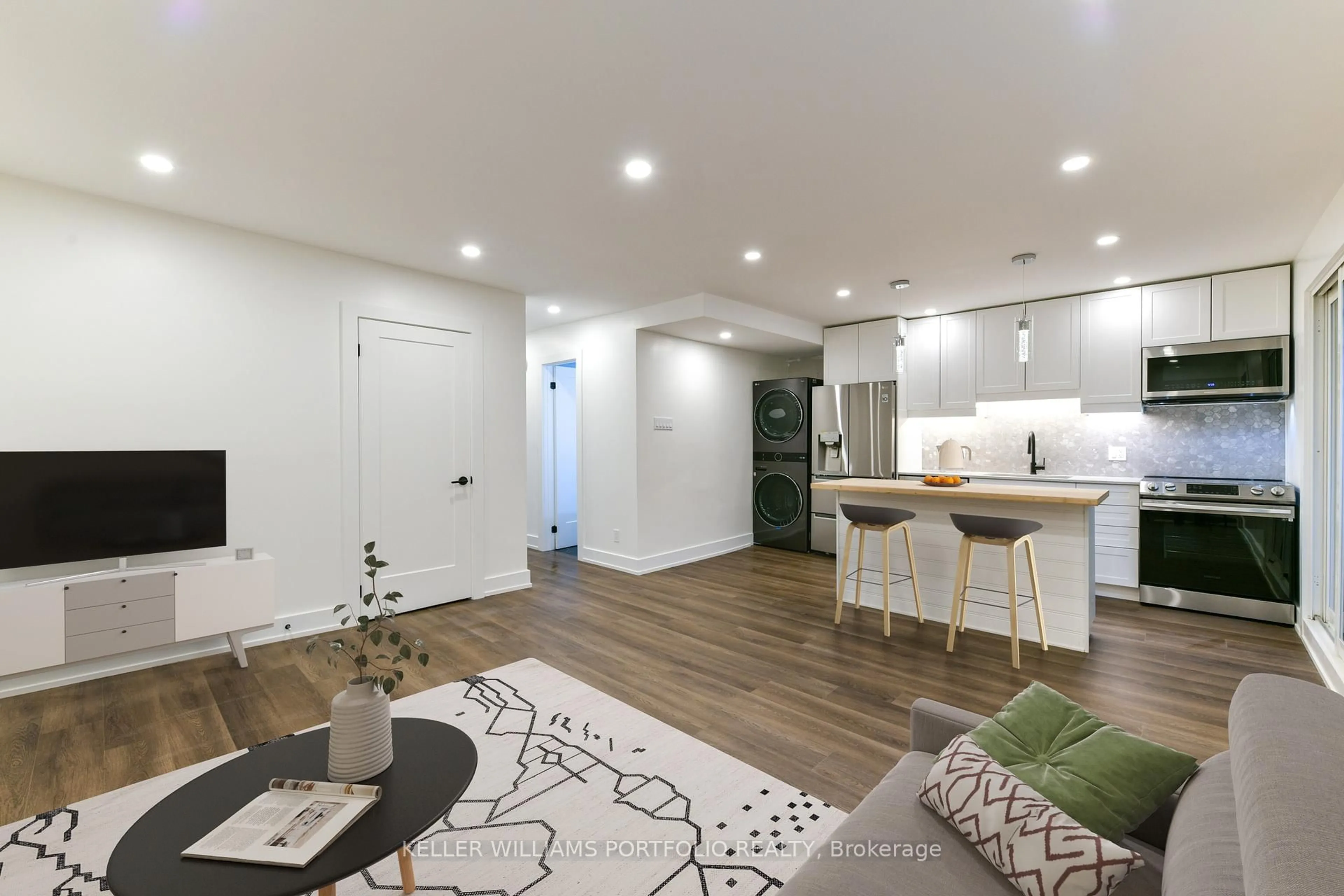 Open concept kitchen, wood/laminate floor for 1250 Davenport Rd, Toronto Ontario M6H 2G9