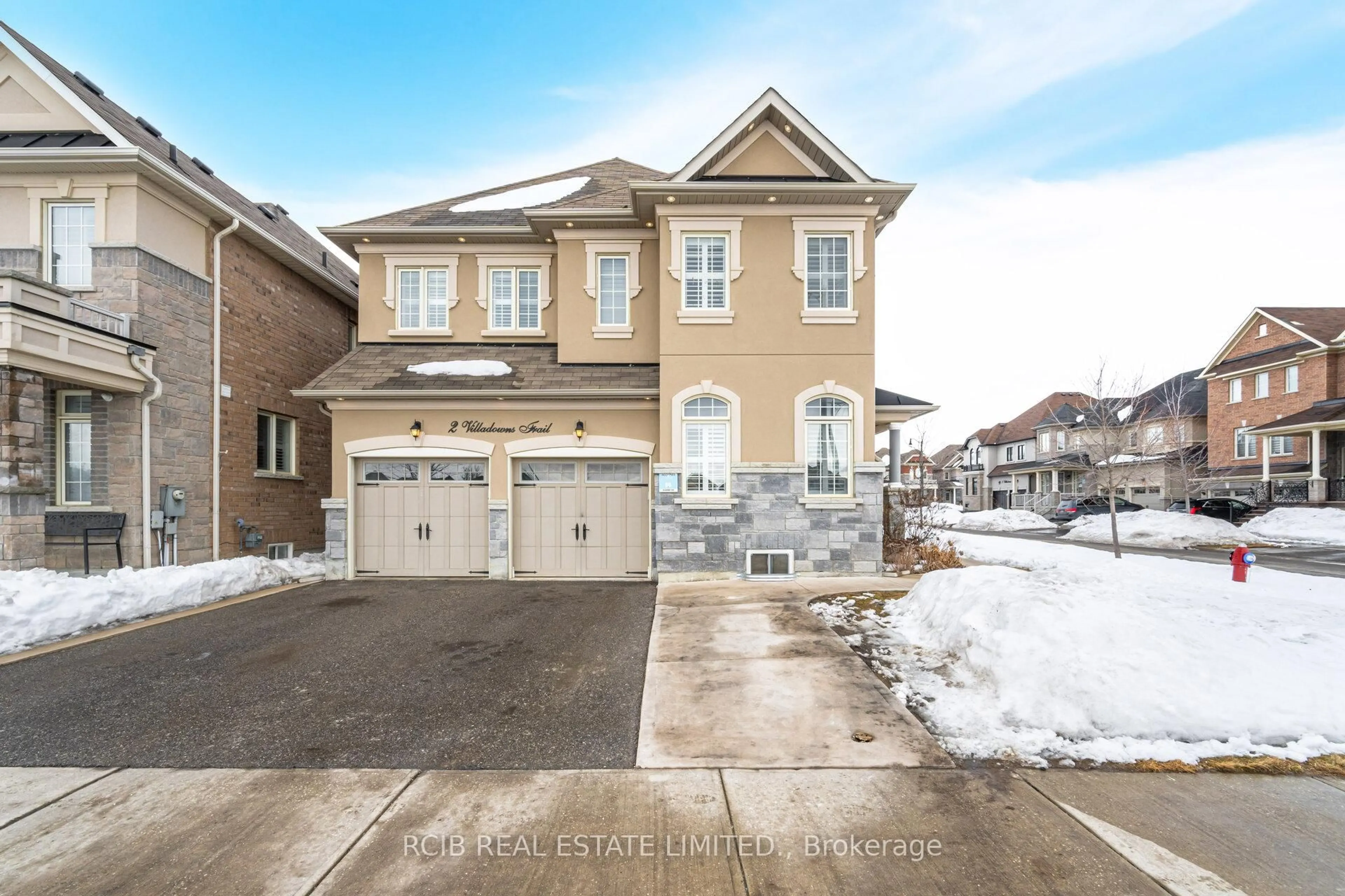 Home with brick exterior material, street for 2 Villadowns Tr, Brampton Ontario L6R 3V5