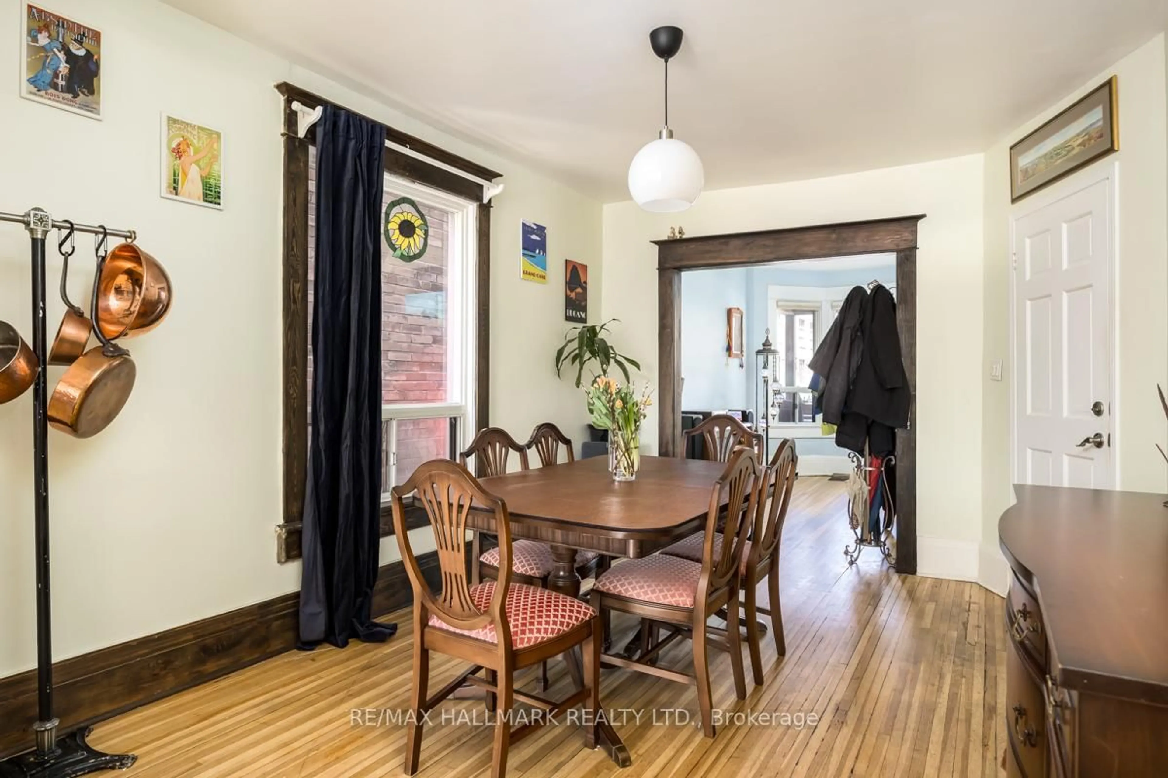 Dining room, wood/laminate floor for 223 Wallace Ave, Toronto Ontario M6H 1V5