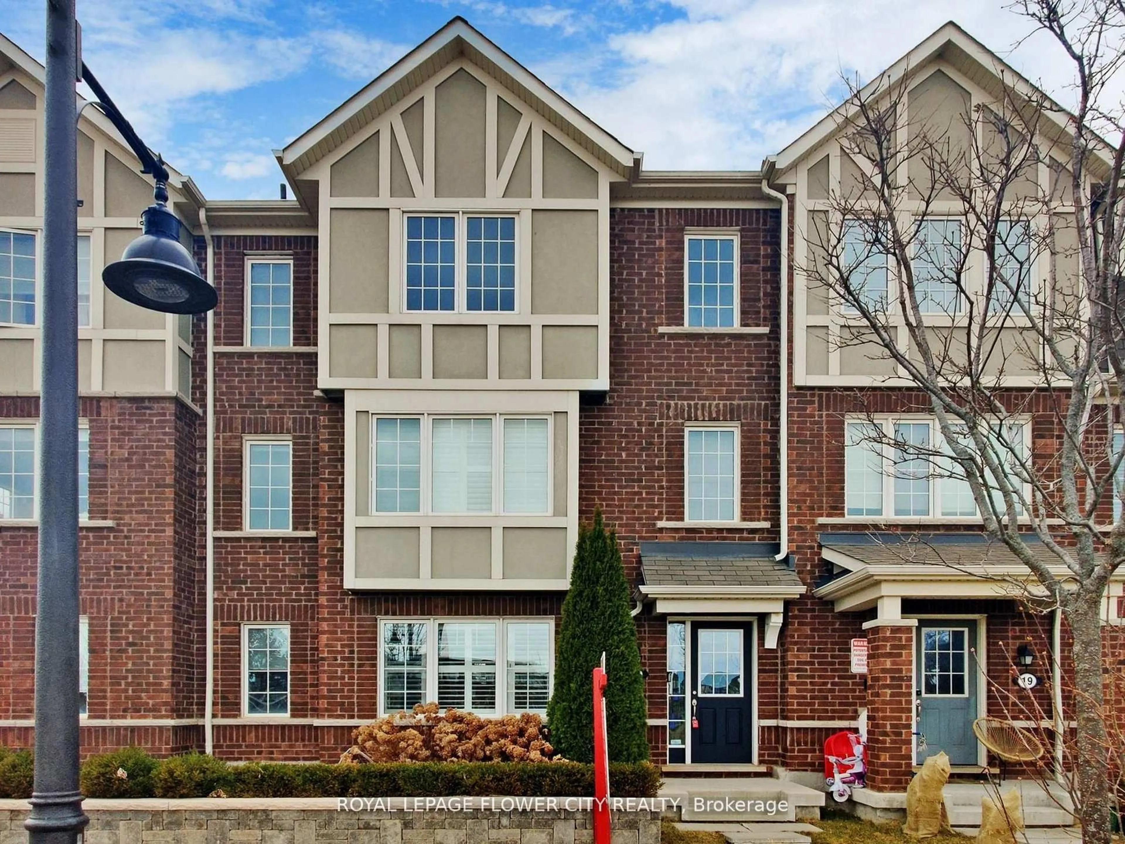 Home with brick exterior material, street for 21 Eckford Lane, Brampton Ontario L7A 4G8
