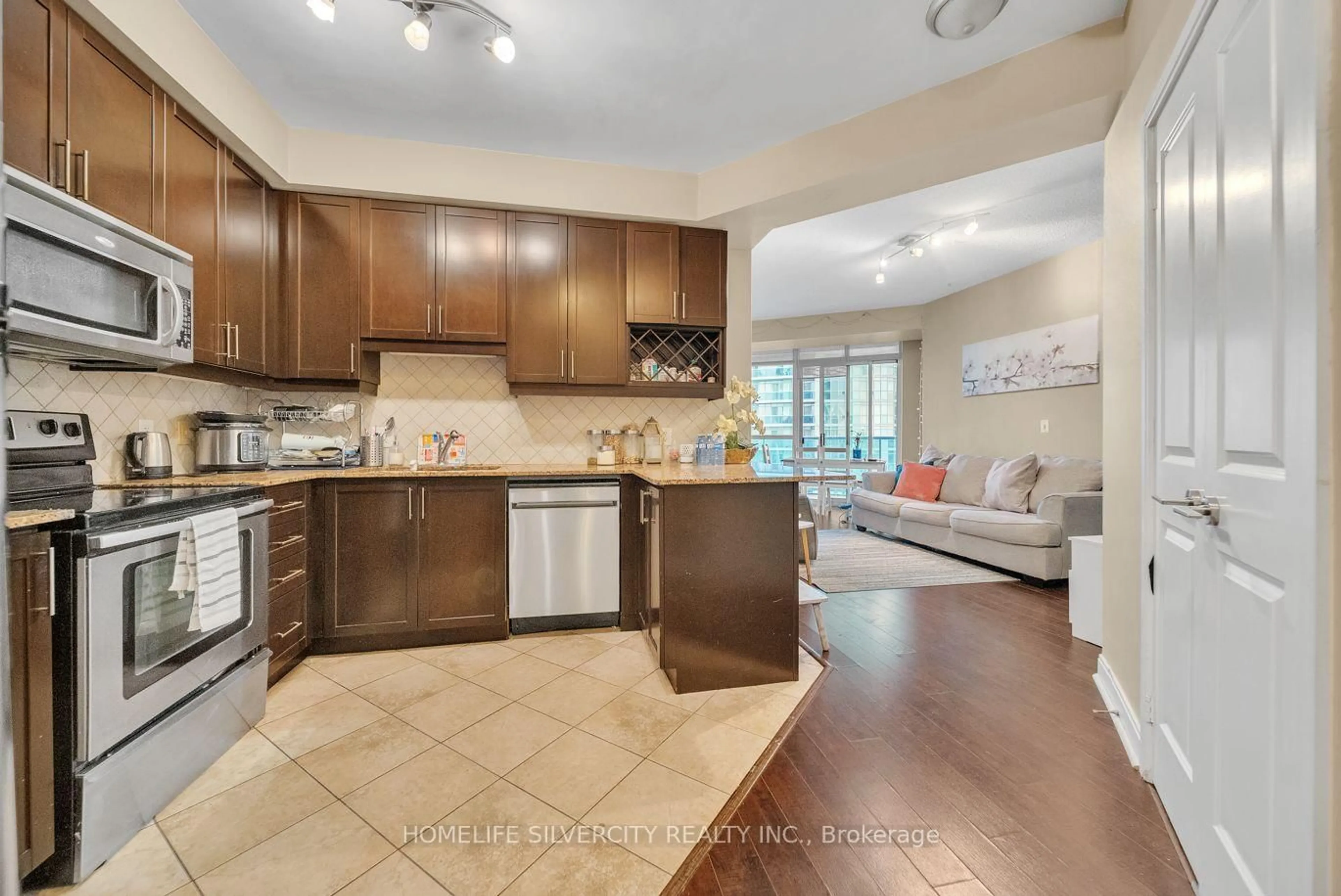 Open concept kitchen, ceramic/tile floor for 80 Absolute Ave #2006, Mississauga Ontario L4Z 0A5