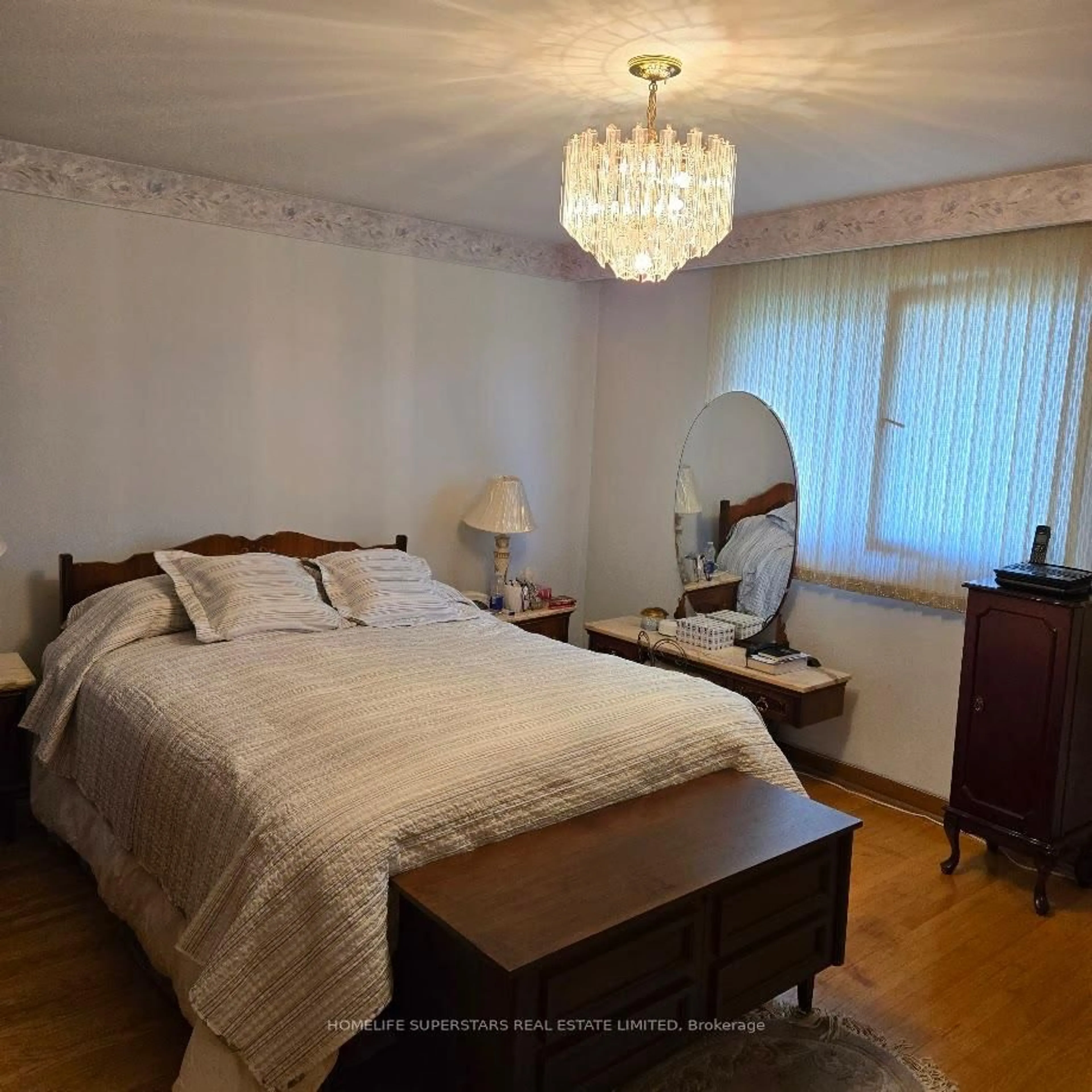 Bedroom with bed, wood/laminate floor for 2361 Nikanna Rd, Mississauga Ontario L5C 2W8