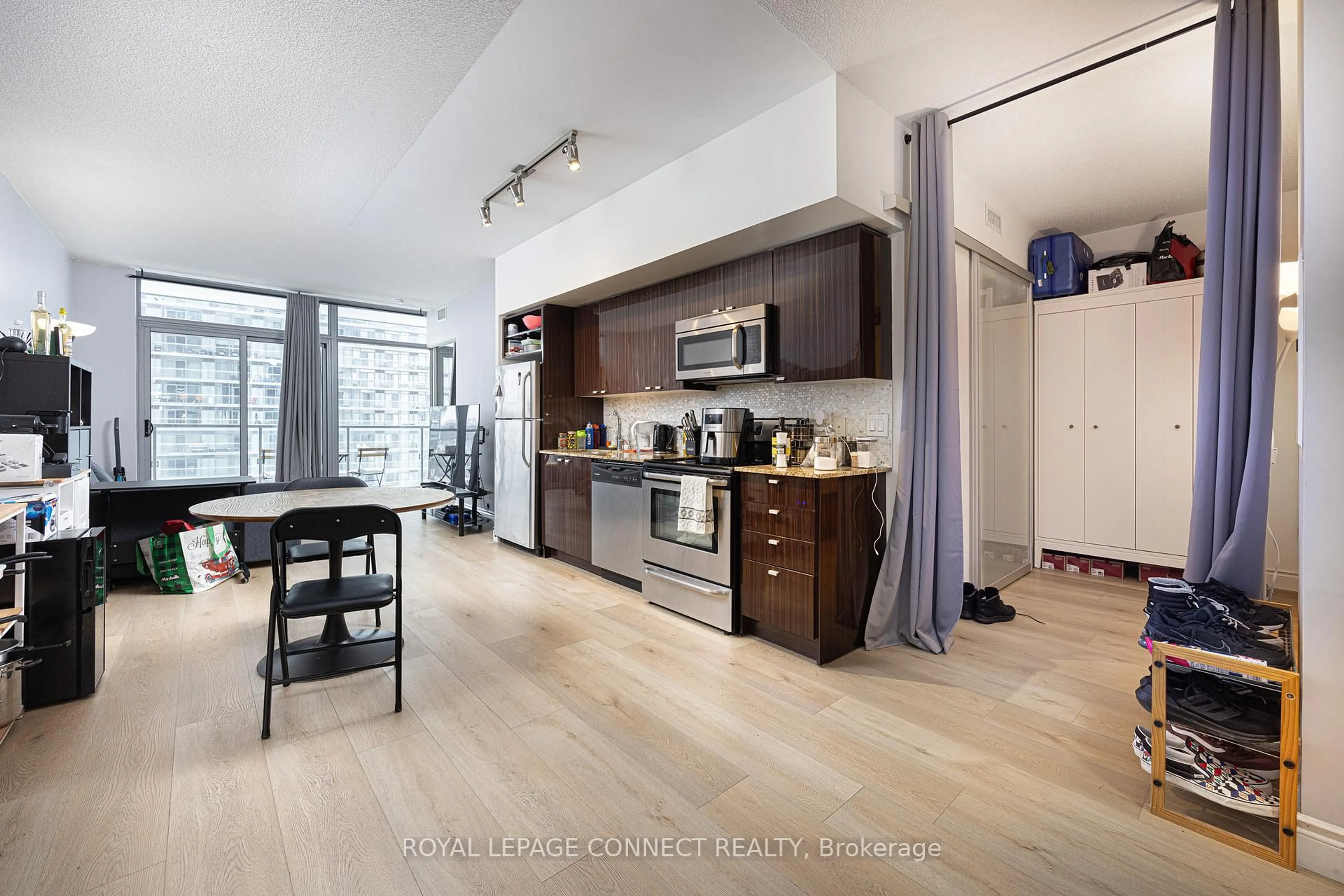 Open concept kitchen, unknown for 105 The Queensway N/A #1215, Toronto Ontario M6S 5B5