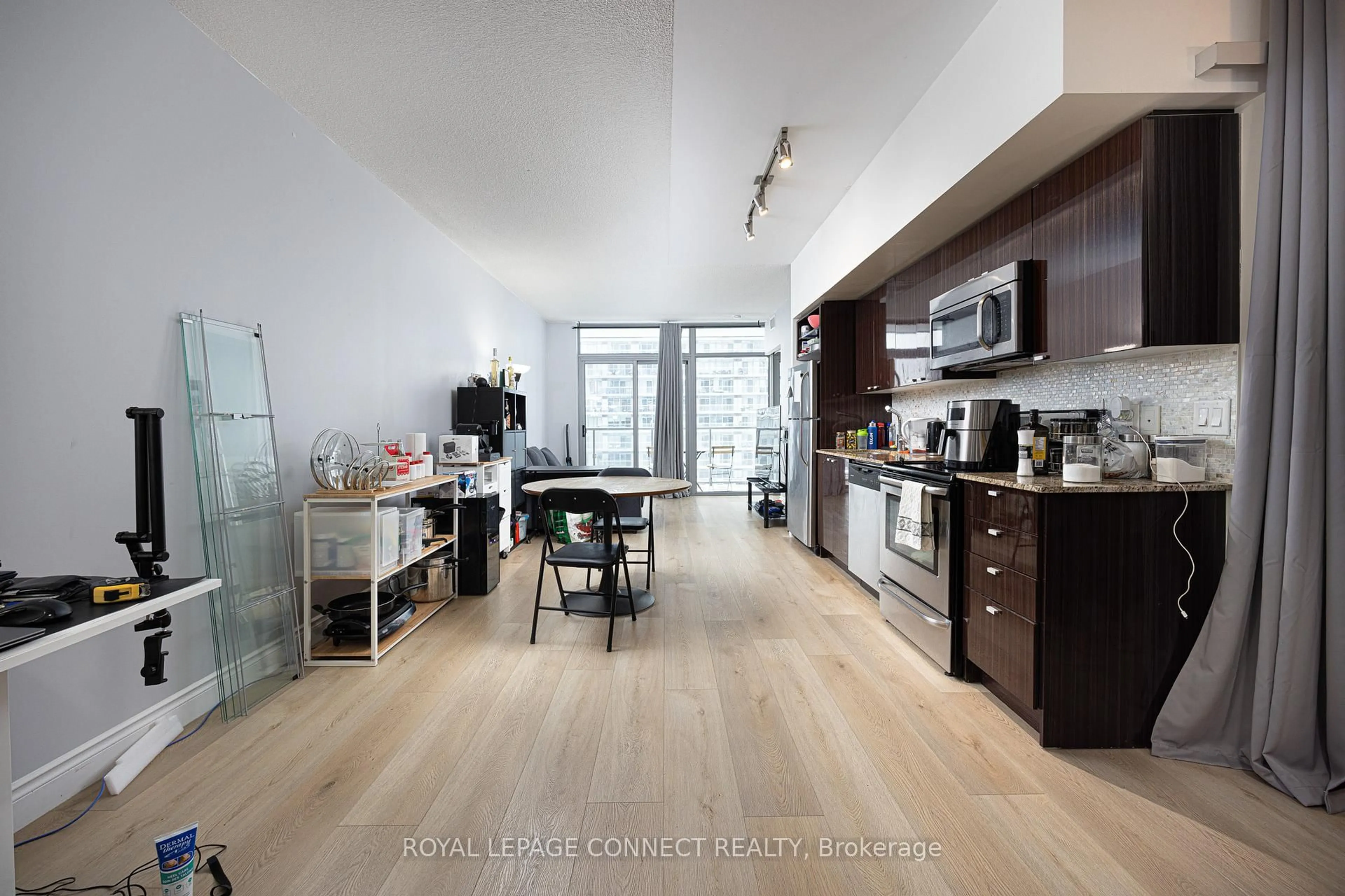 Open concept kitchen, unknown for 105 The Queensway N/A #1215, Toronto Ontario M6S 5B5