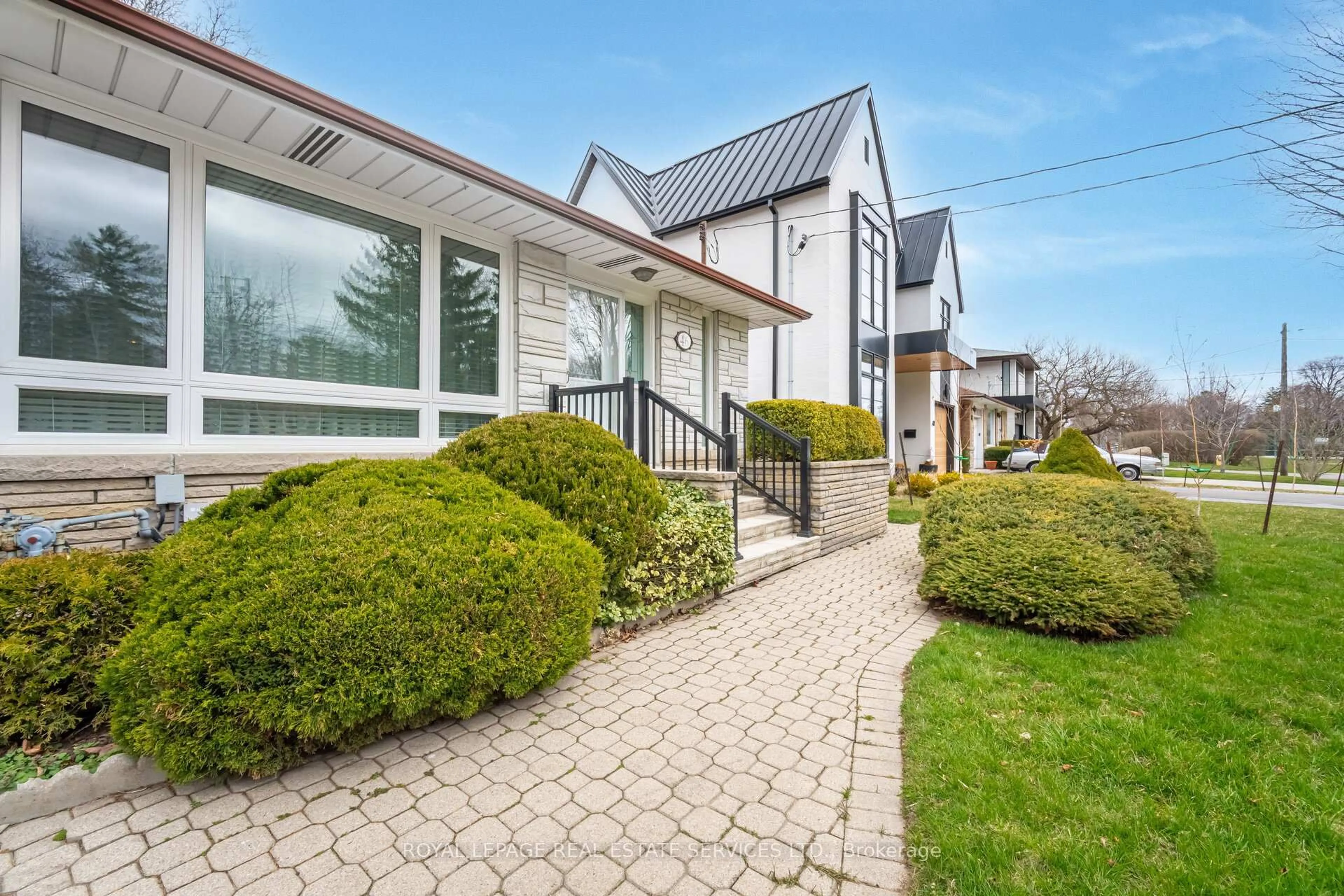 Home with vinyl exterior material, street for 46 Cardigan Rd, Toronto Ontario M8Z 2W2