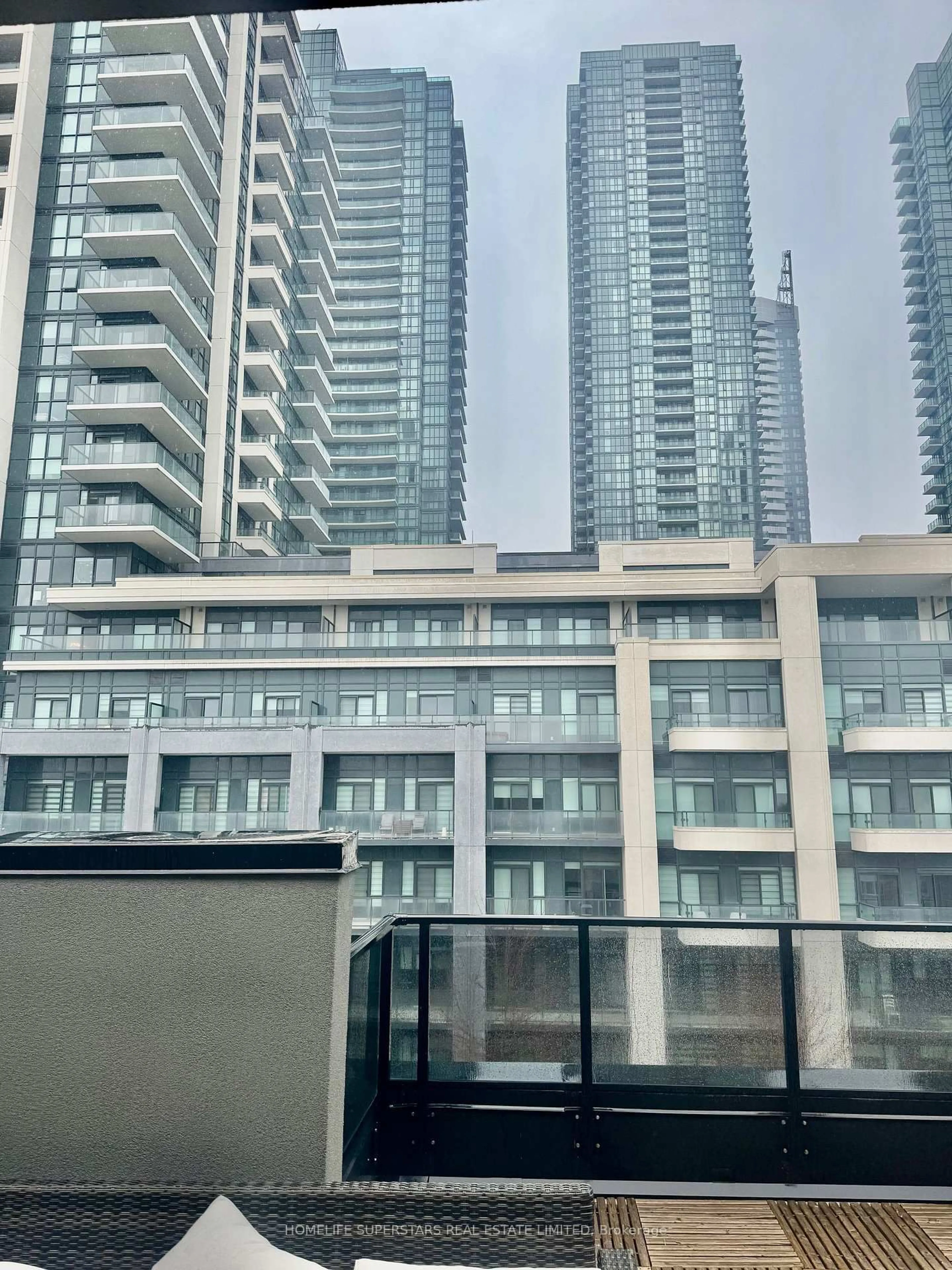 Balcony in the apartment, city buildings view from balcony for 4070 Parkside Village Dr #TH 3, Mississauga Ontario L5B 0K2