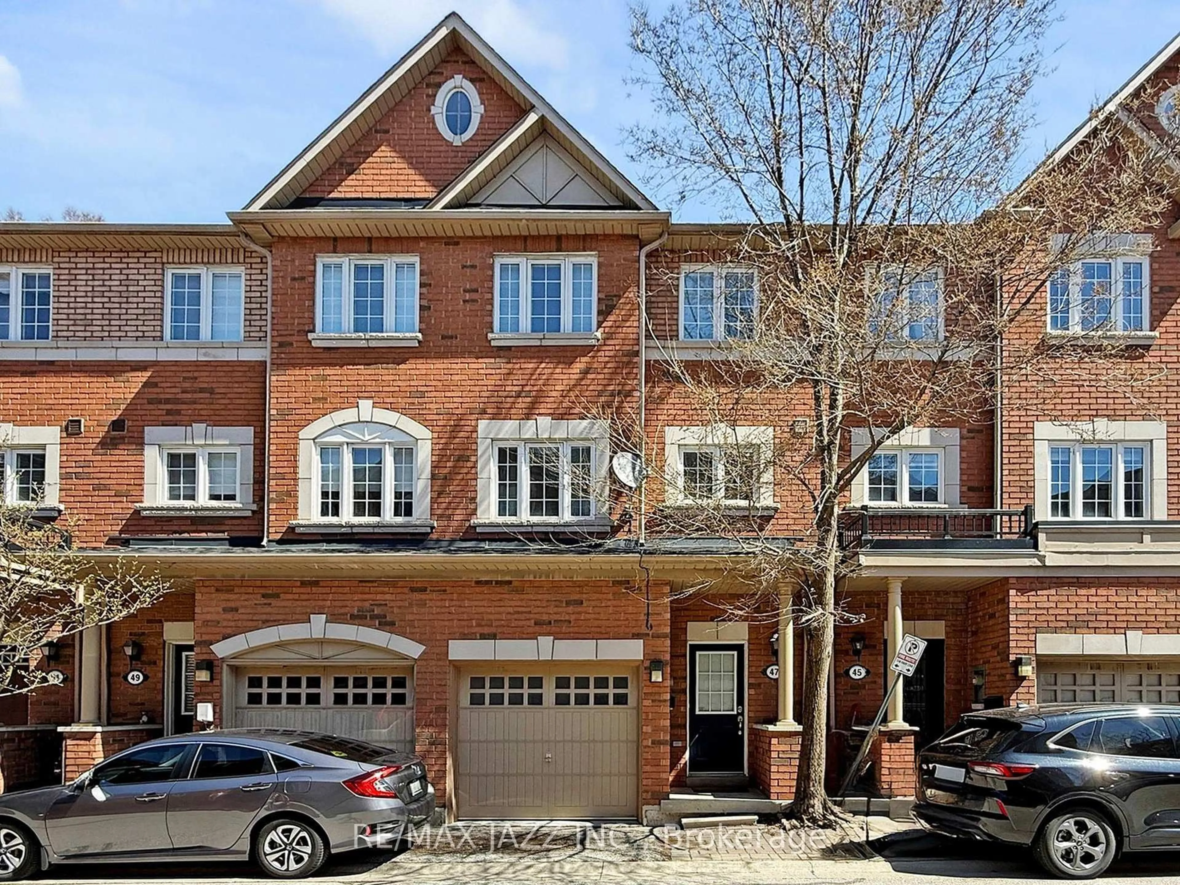 Home with brick exterior material, street for 47 Elphick Lane, Toronto Ontario M9N 4A2