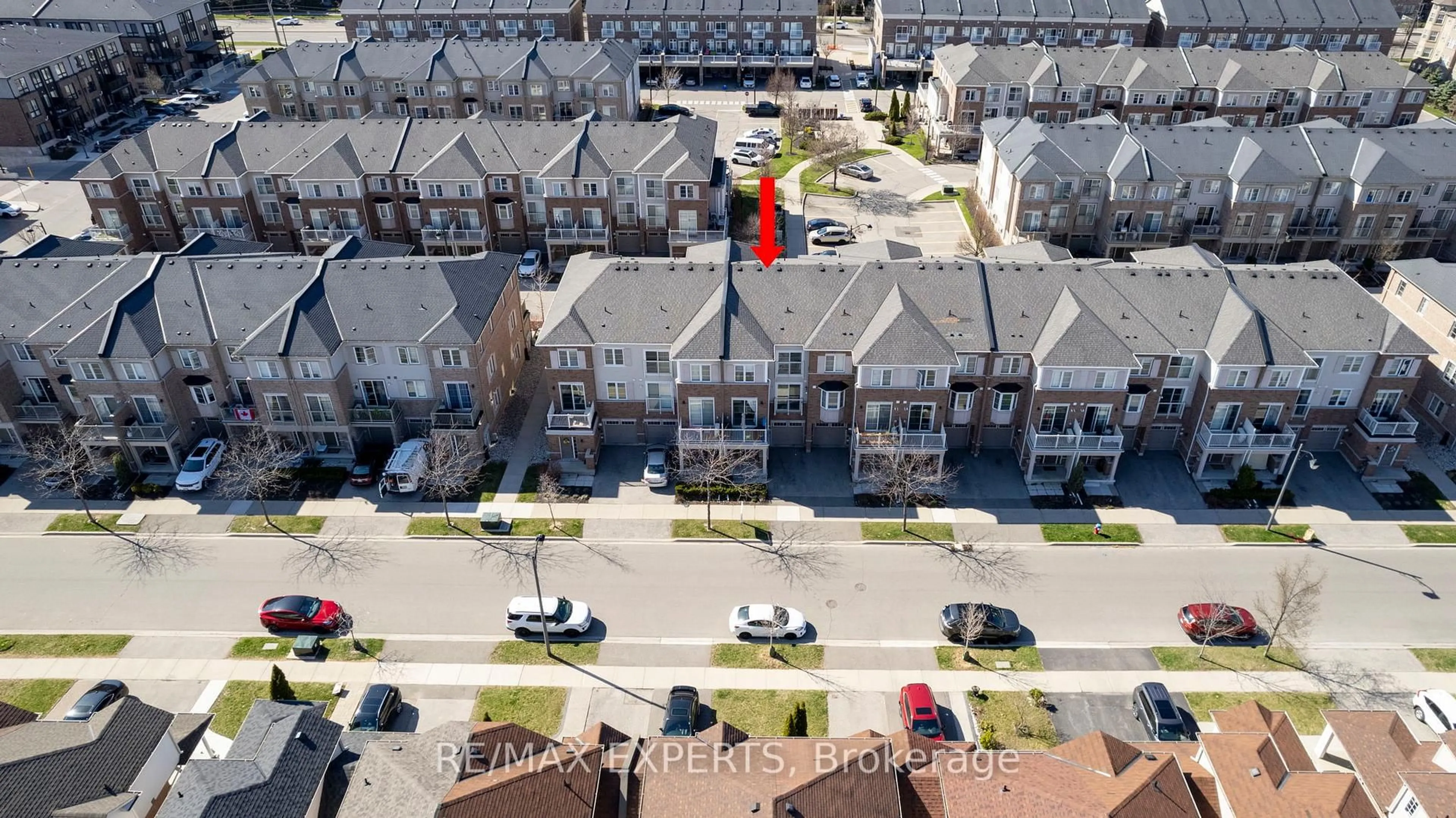 A pic from outside/outdoor area/front of a property/back of a property/a pic from drone, street for 165 Hampshire Way #130, Milton Ontario L9T 8M7