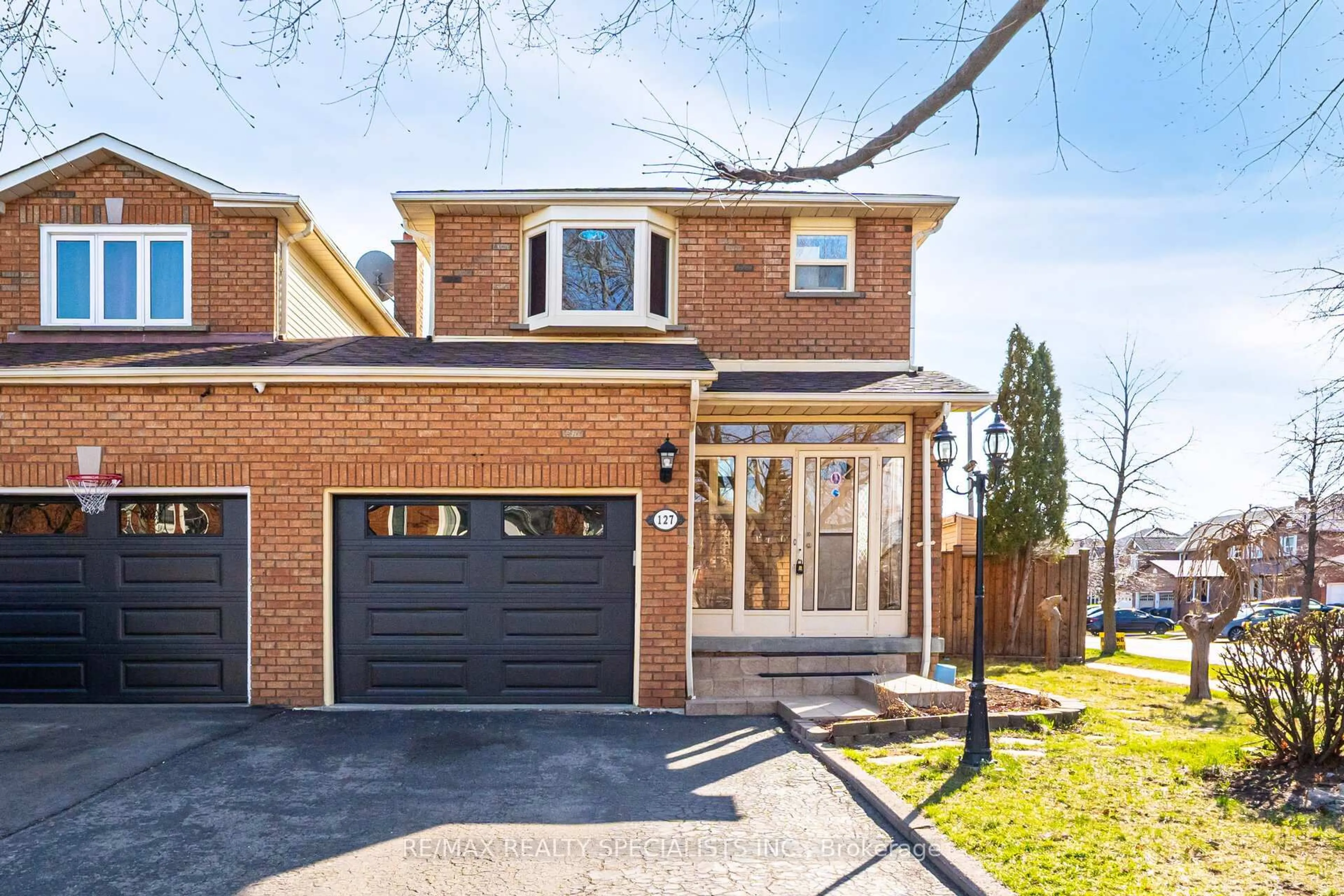 Home with brick exterior material, street for 127 Tulip Dr, Brampton Ontario L6Y 3X6