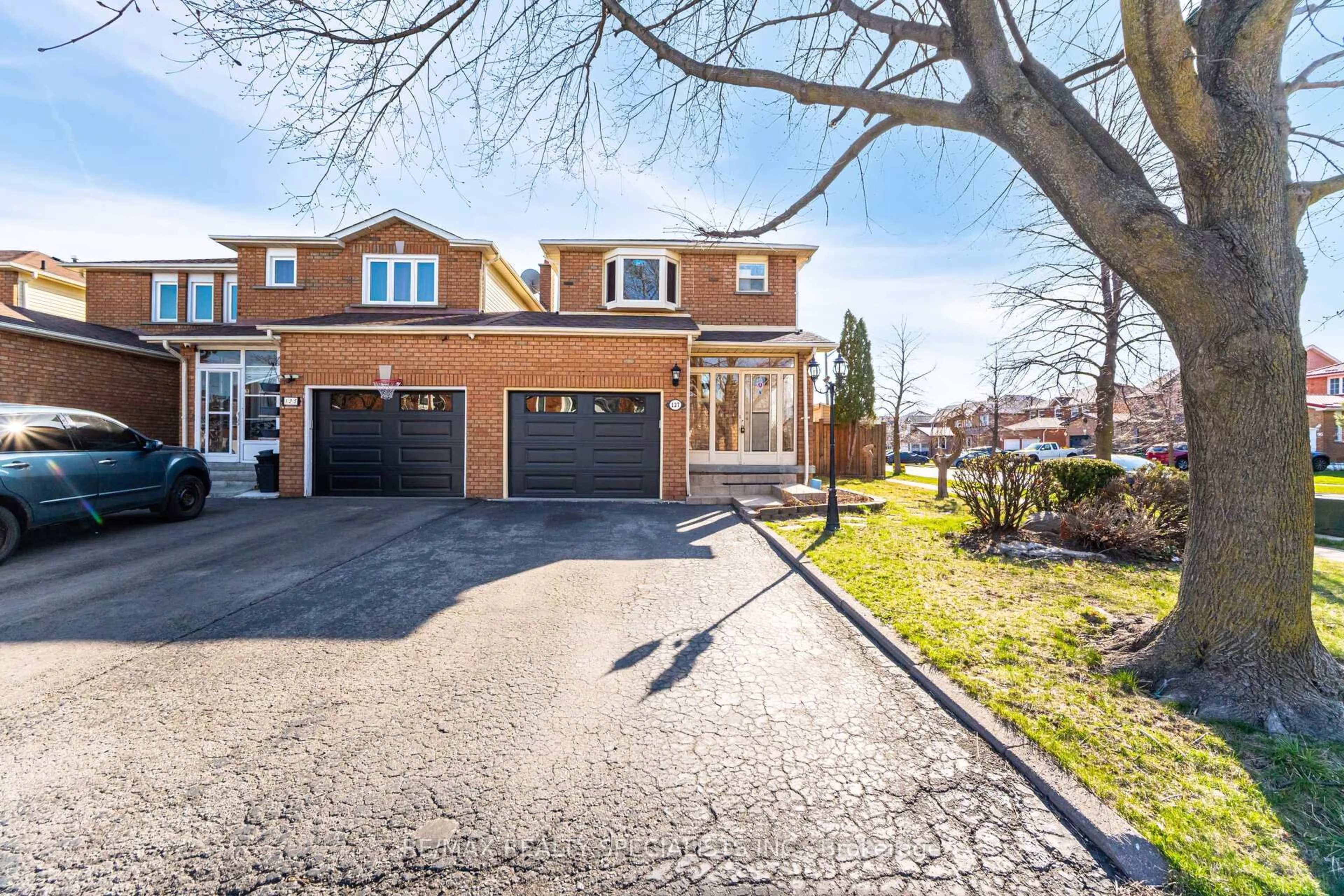 Home with brick exterior material, street for 127 Tulip Dr, Brampton Ontario L6Y 3X6