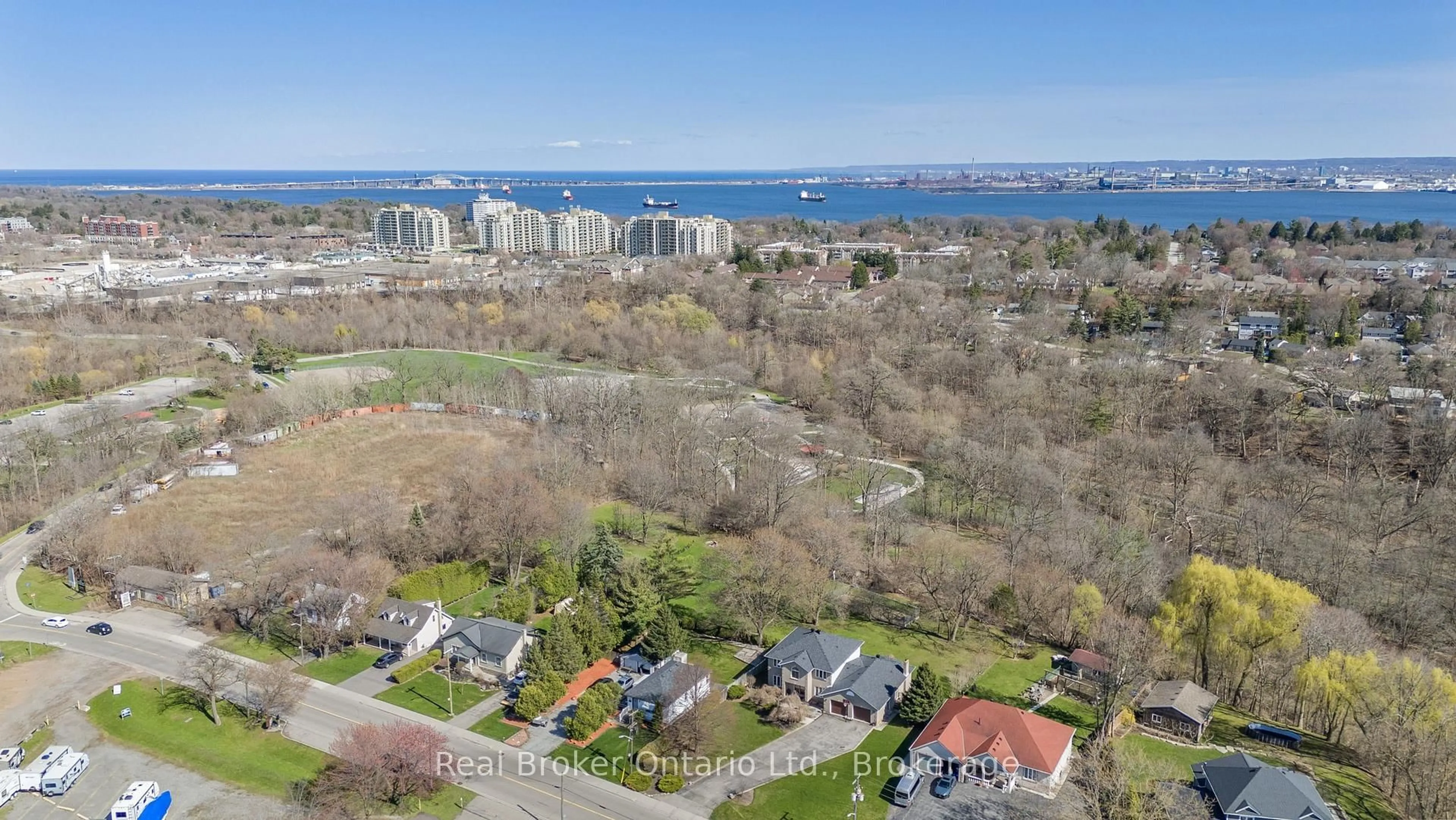 A pic from outside/outdoor area/front of a property/back of a property/a pic from drone, water/lake/river/ocean view for 266 Sumach Dr, Burlington Ontario L7T 0B5