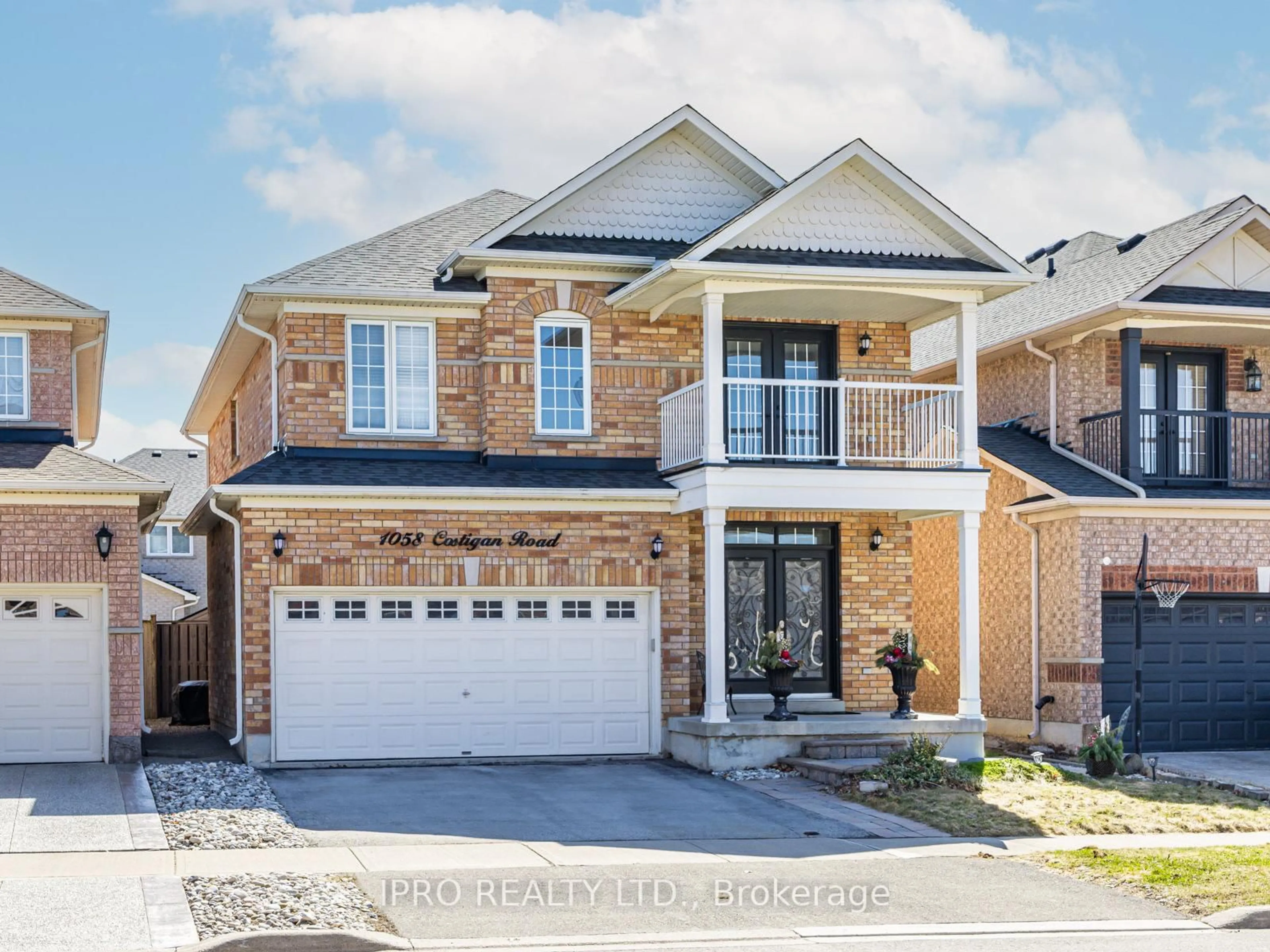 Home with brick exterior material, street for 1058 Costigan Rd, Milton Ontario L9T 6N6