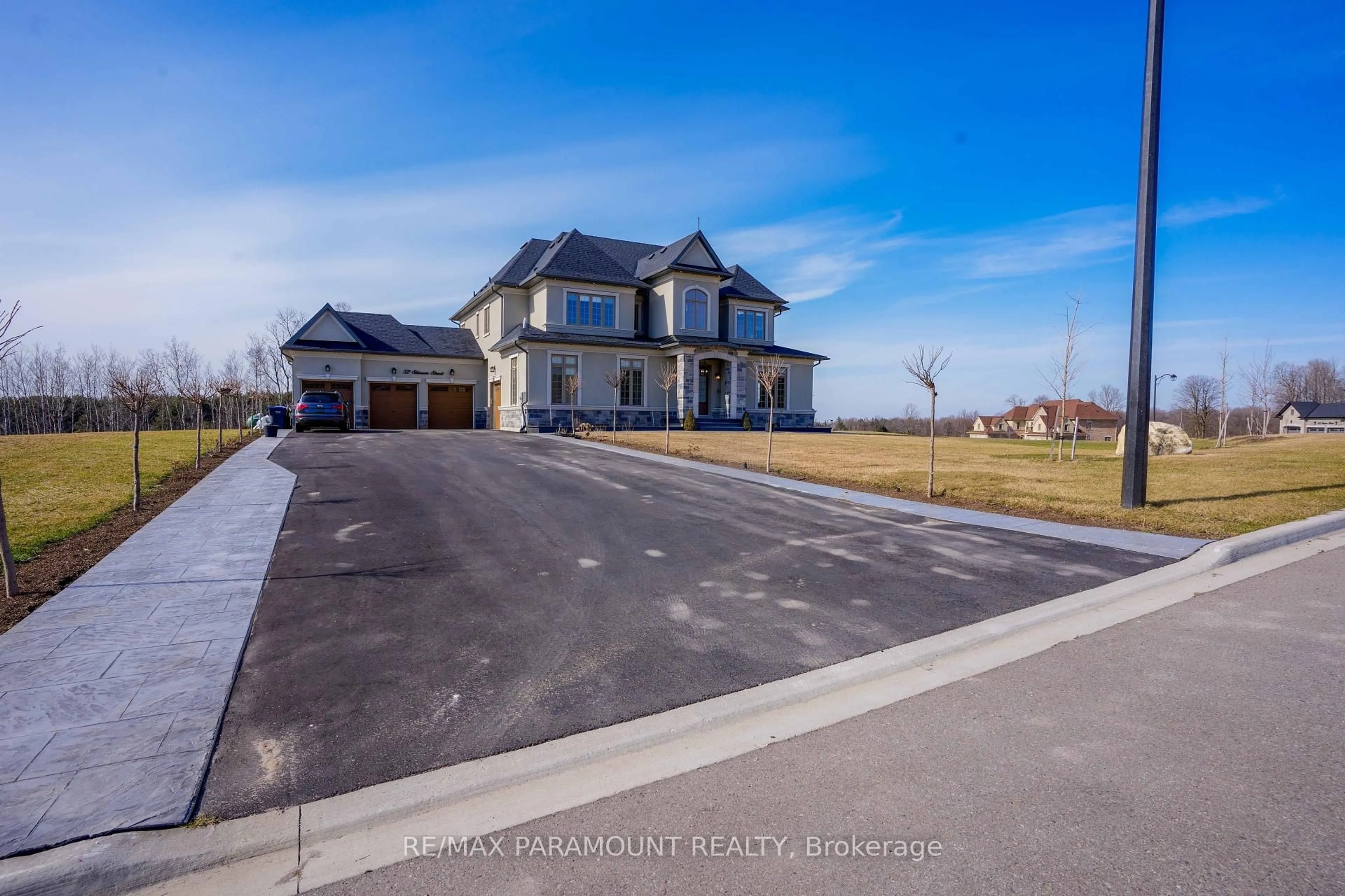 A pic from outside/outdoor area/front of a property/back of a property/a pic from drone, street for 52 Stinson St, Caledon Ontario L7E 4L6