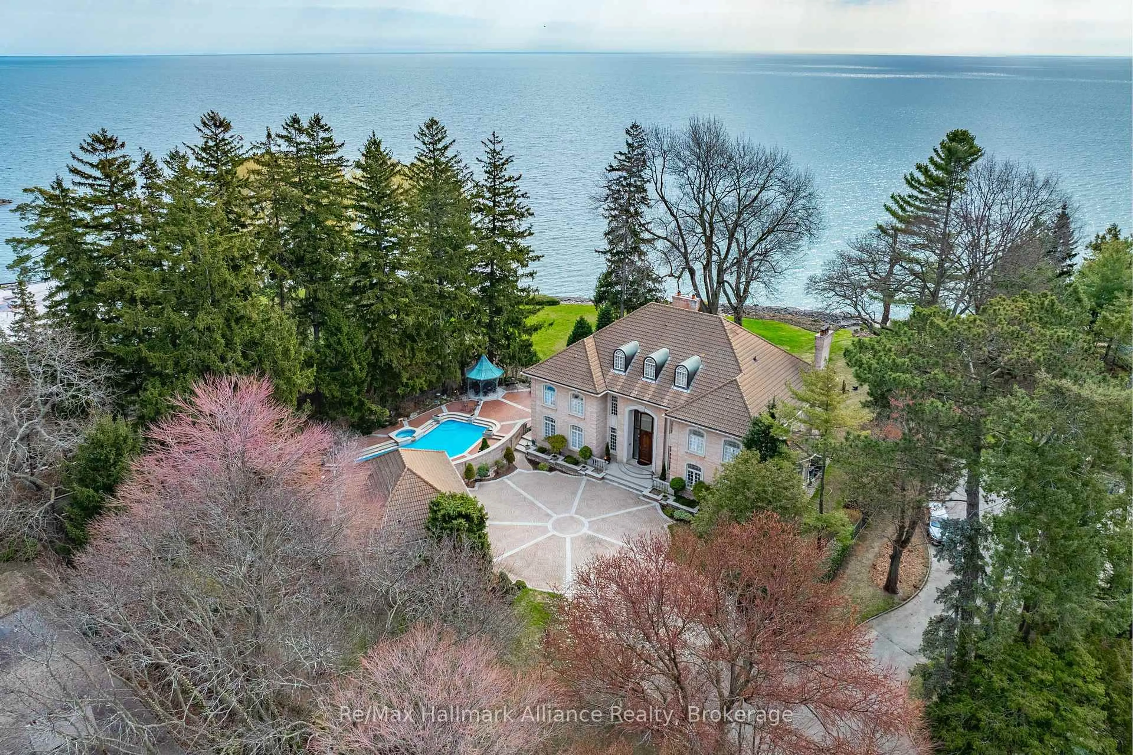 A pic from outside/outdoor area/front of a property/back of a property/a pic from drone, water/lake/river/ocean view for 49 Cox Dr, Oakville Ontario L6J 4P8