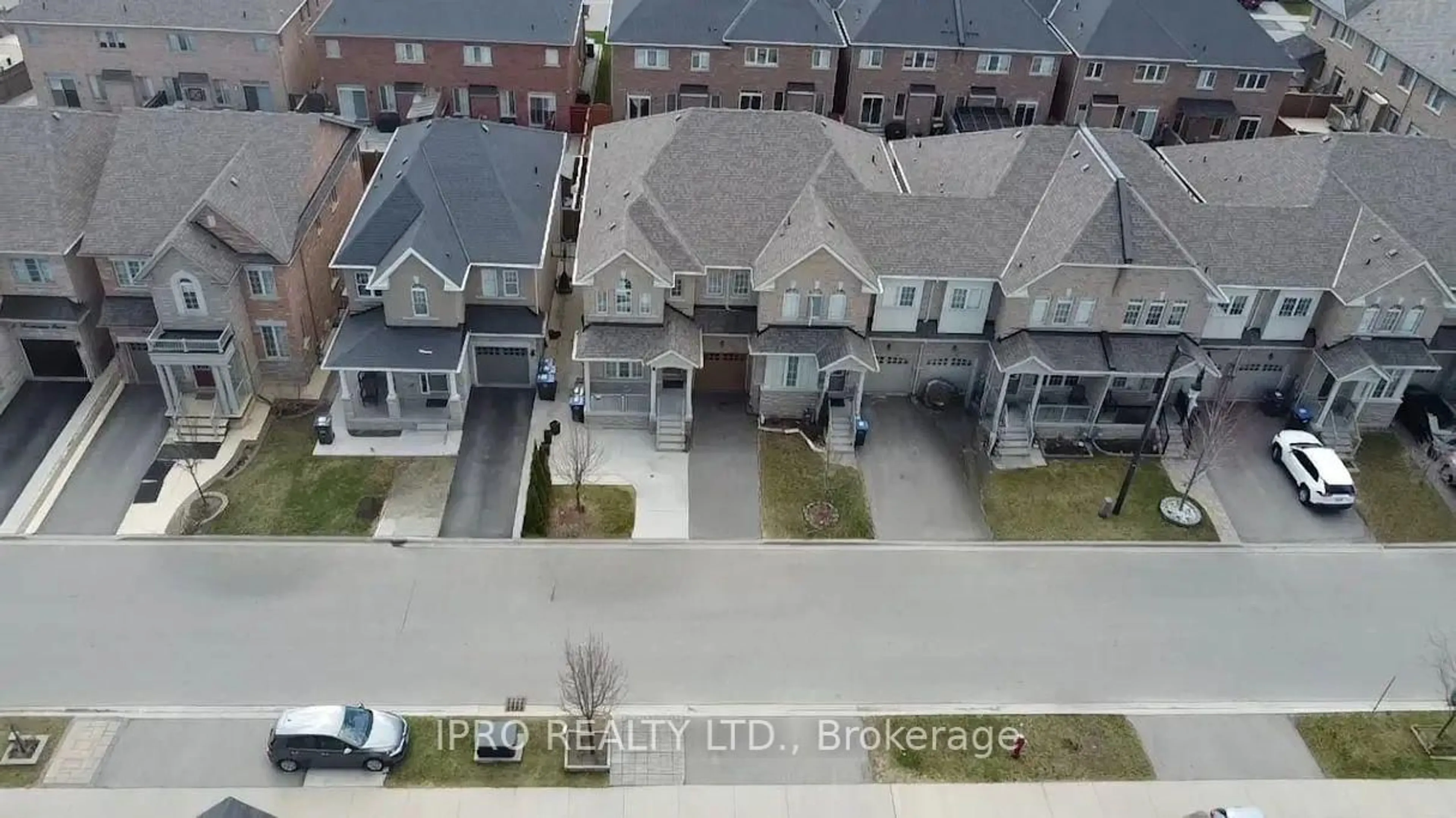 A pic from outside/outdoor area/front of a property/back of a property/a pic from drone, street for 11 Trentonian St, Brampton Ontario L6R 3W2
