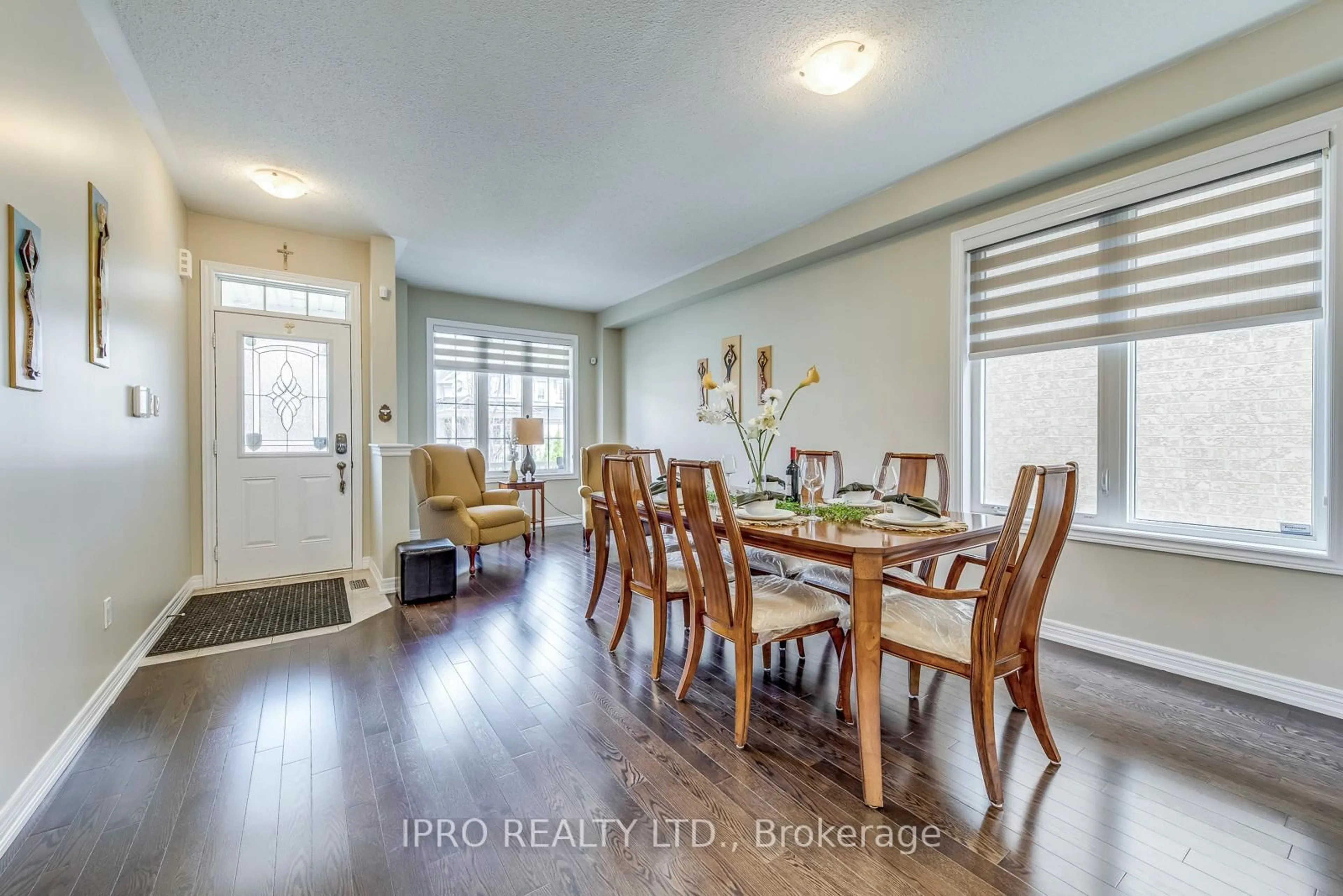 Dining room, wood/laminate floor for 11 Trentonian St, Brampton Ontario L6R 3W2