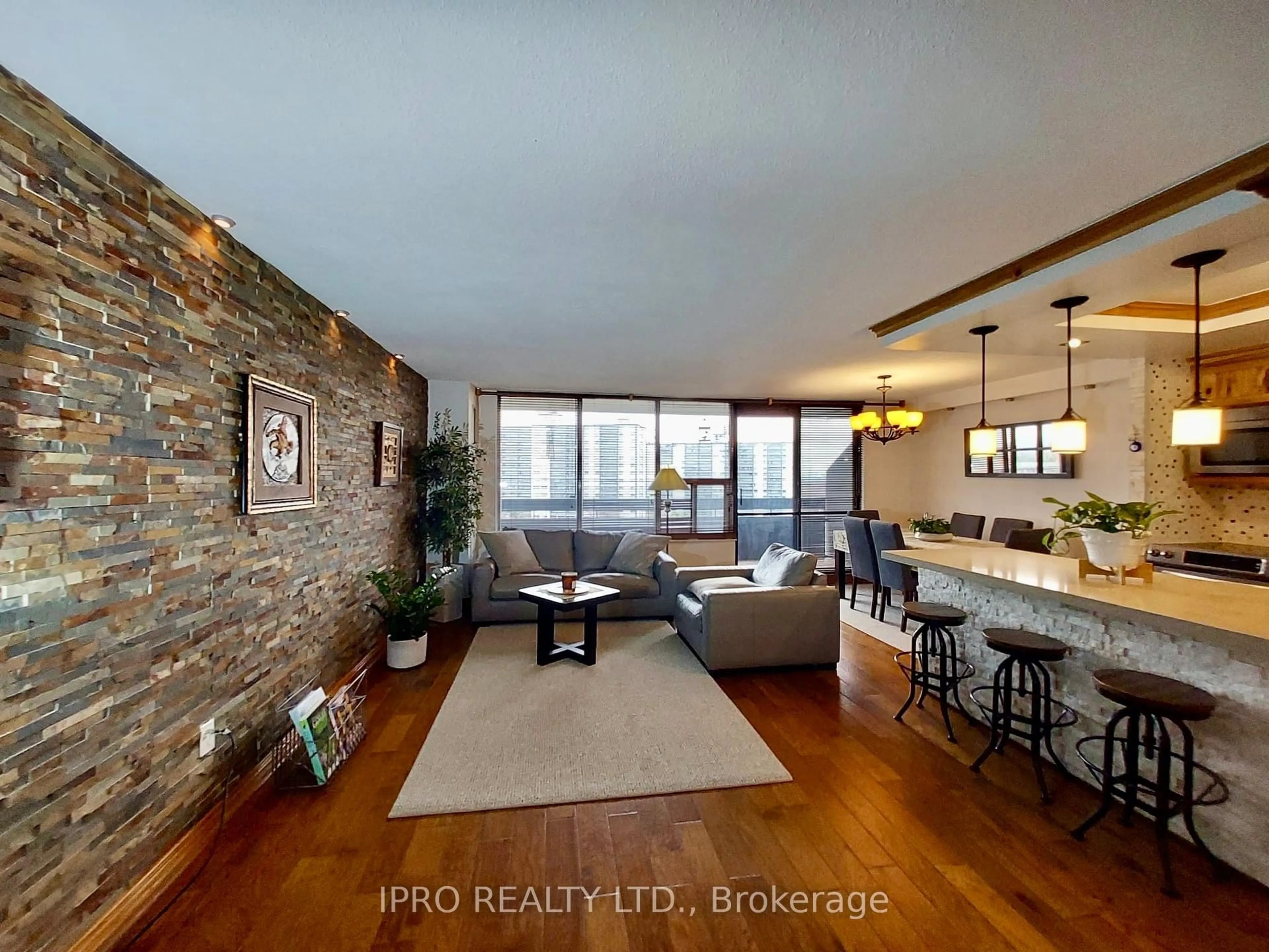 Living room with furniture, unknown for 11 Wincott Dr #1205, Toronto Ontario M9R 2R9