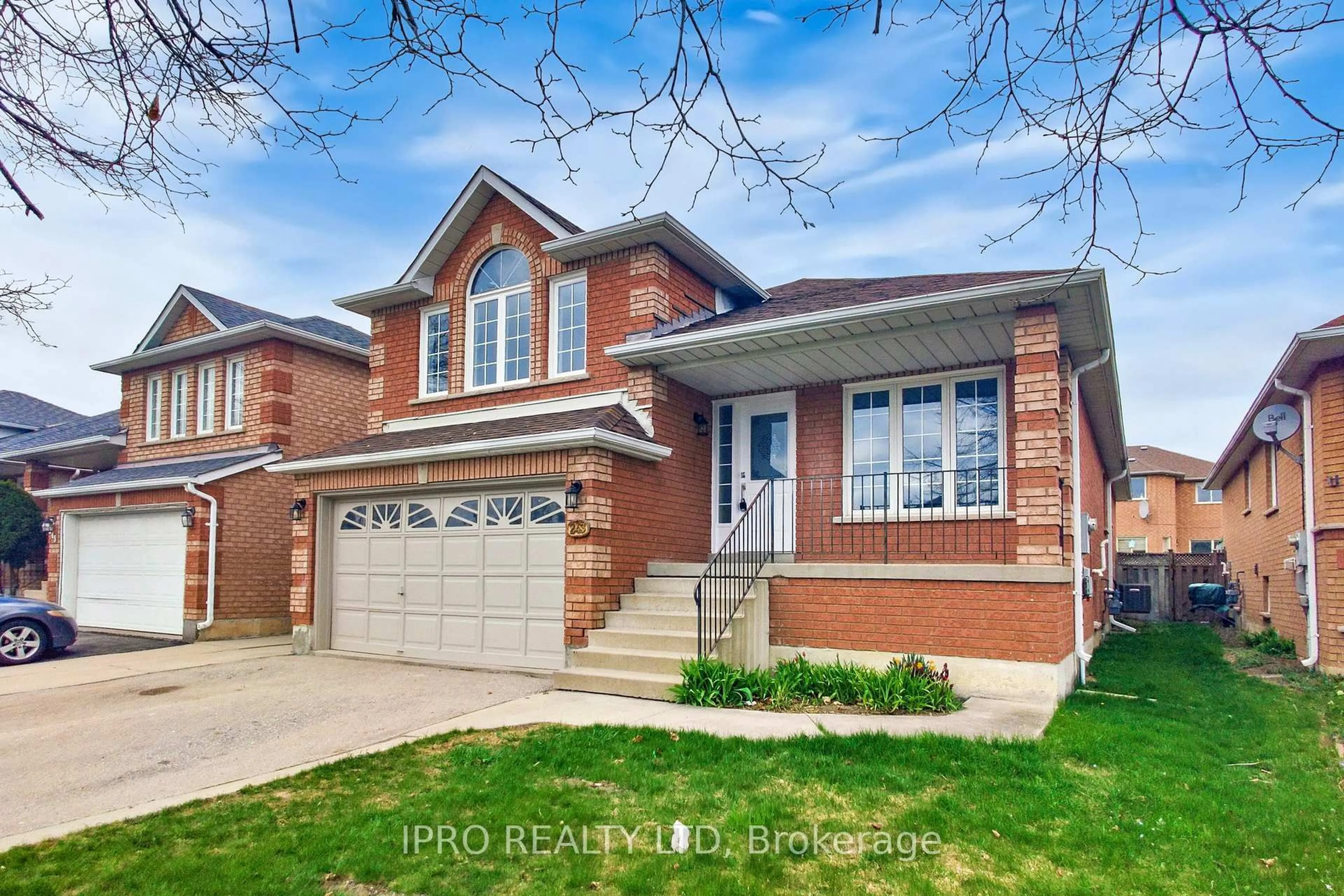 Home with brick exterior material, street for 243 Mountainberry Rd, Brampton Ontario L6R 1H9