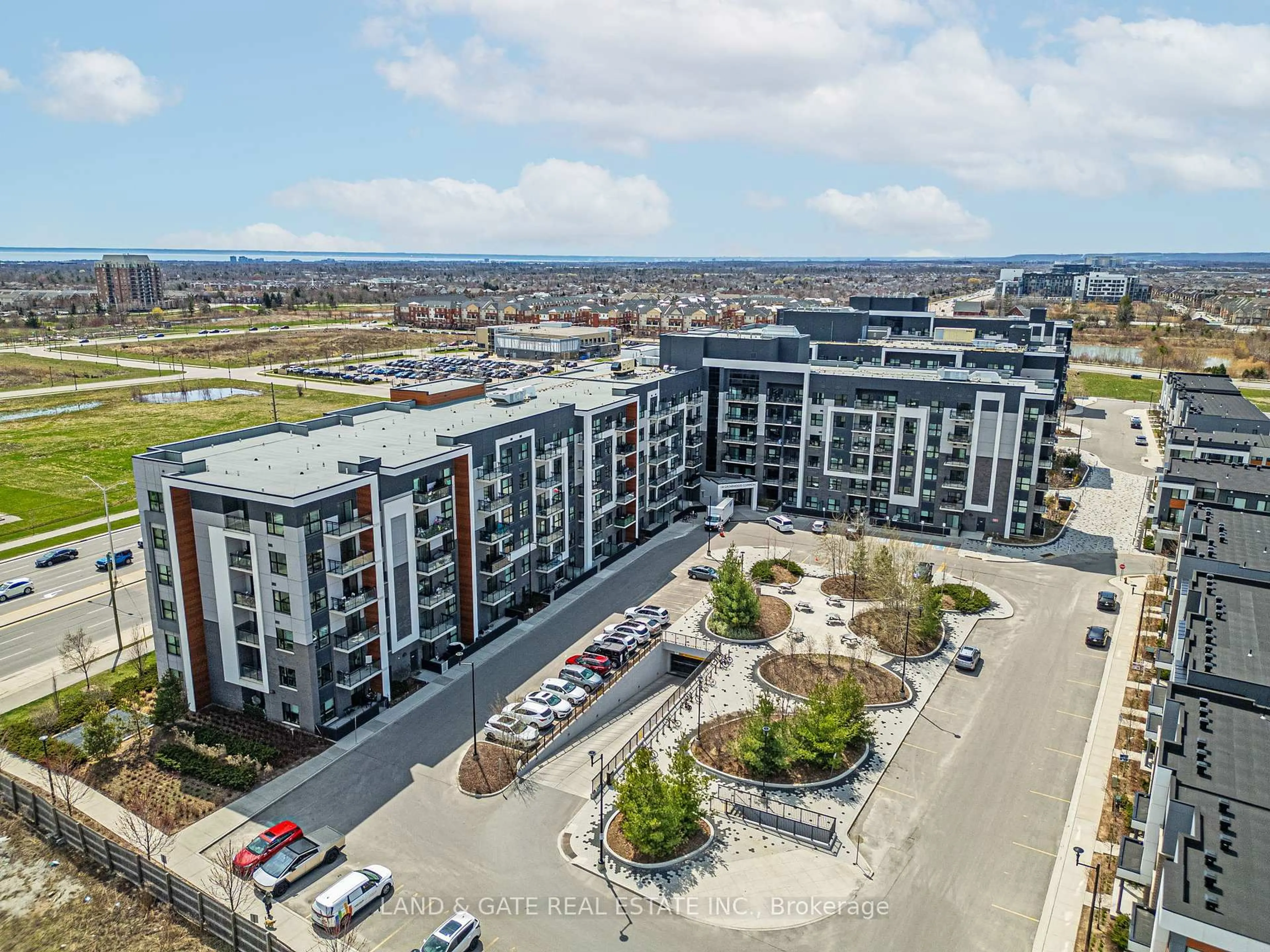 A pic from outside/outdoor area/front of a property/back of a property/a pic from drone, city buildings view from balcony for 128 Grovewood Common #319, Oakville Ontario L6H 0X3