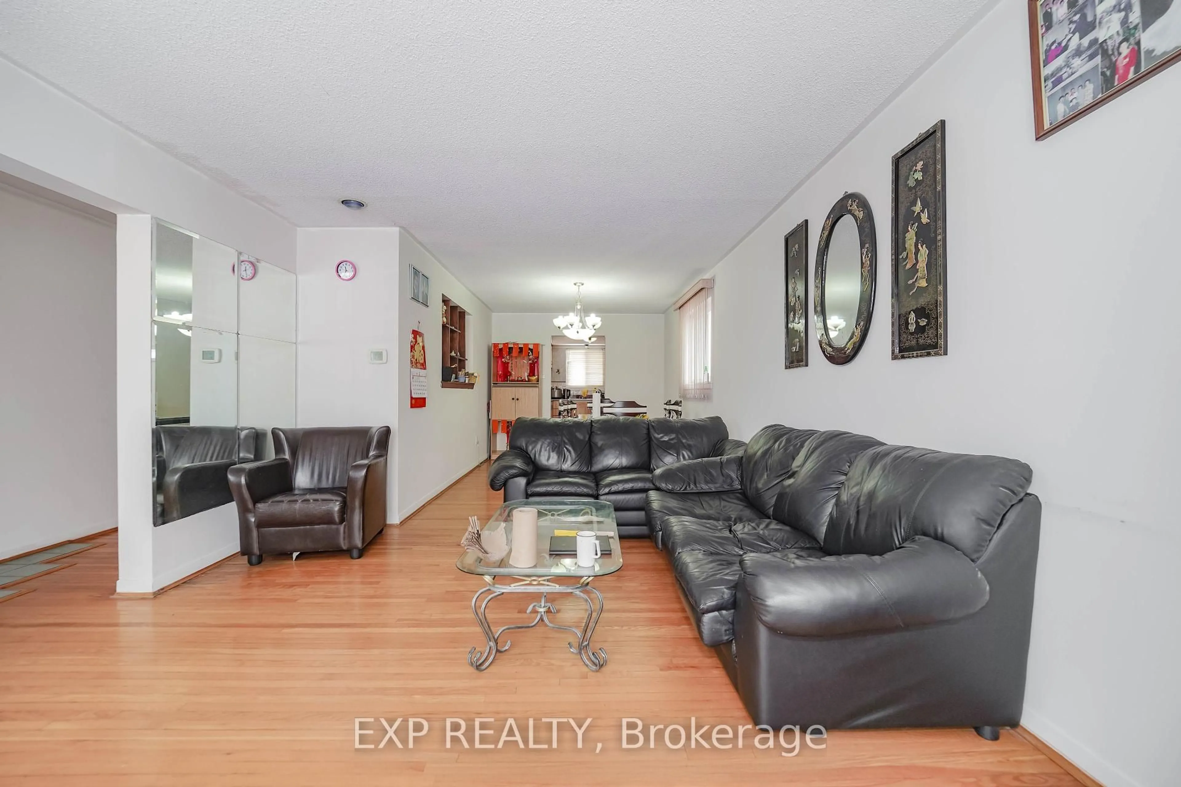 Living room with furniture, unknown for 23 Cloverdale Dr, Brampton Ontario L6T 2T5