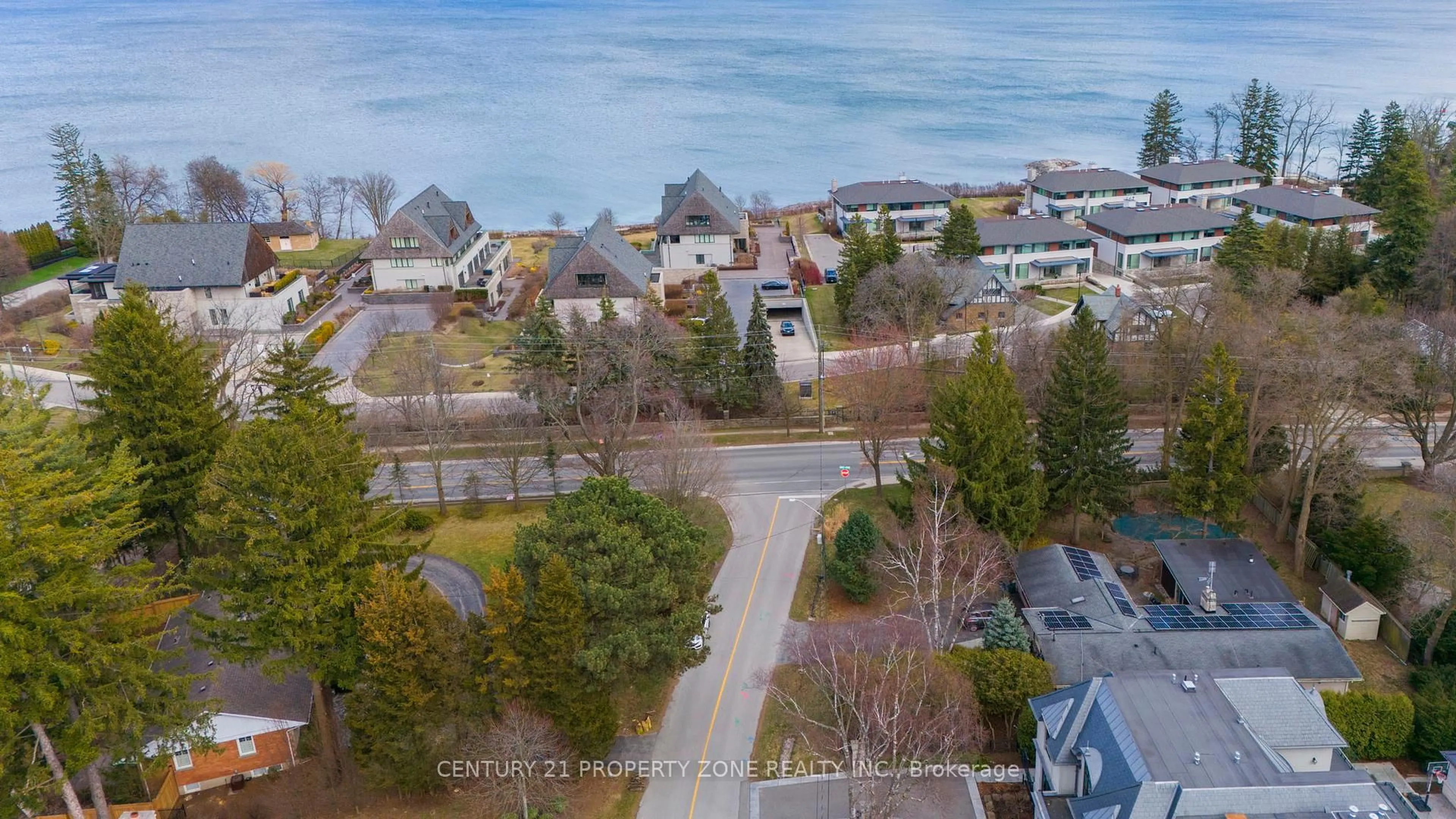 A pic from outside/outdoor area/front of a property/back of a property/a pic from drone, water/lake/river/ocean view for 1503 Lakeshore Rd, Oakville Ontario L6J 1L9
