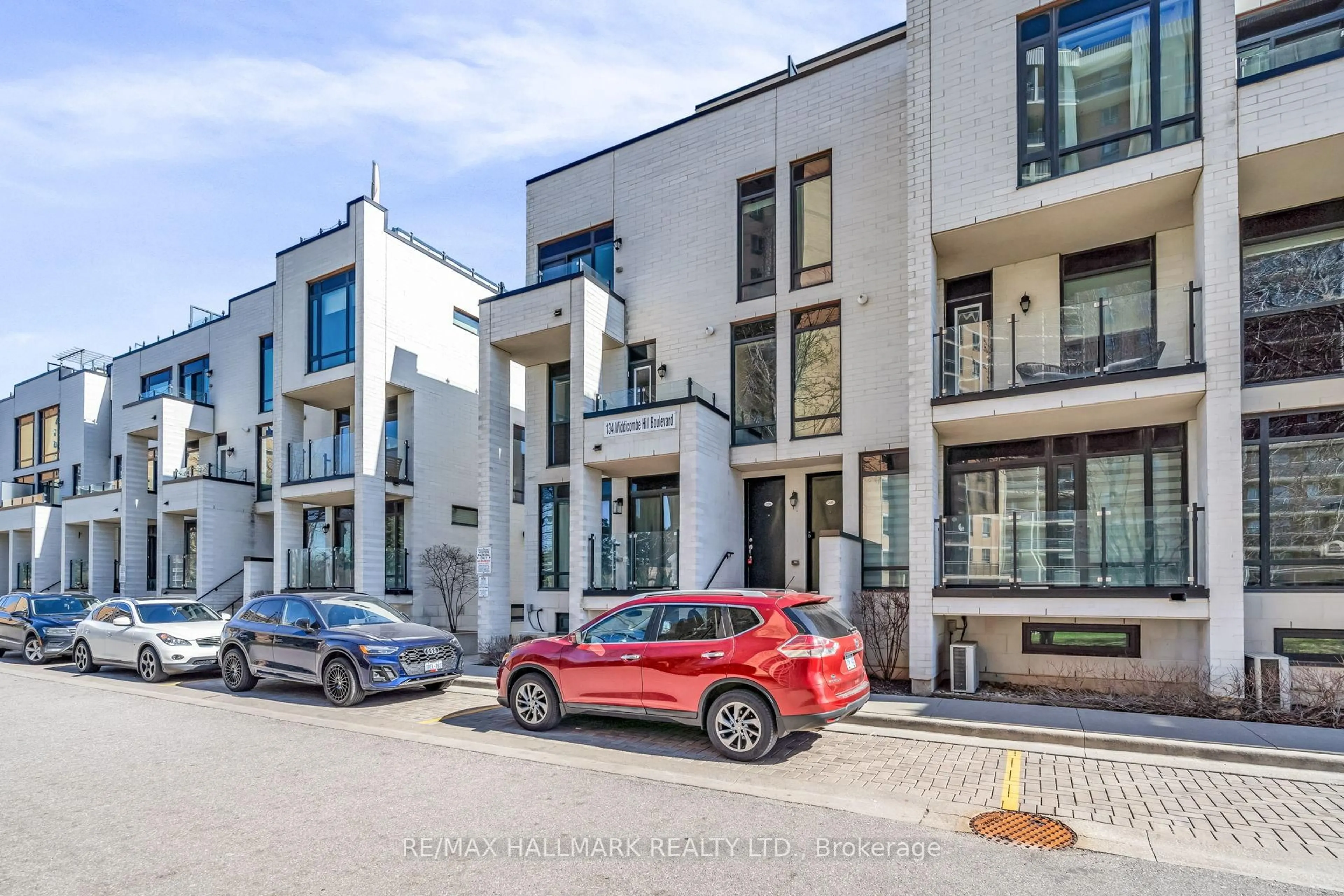 A pic from outside/outdoor area/front of a property/back of a property/a pic from drone, street for 134 Widdicombe Hill Blvd #206, Toronto Ontario M9R 0A9