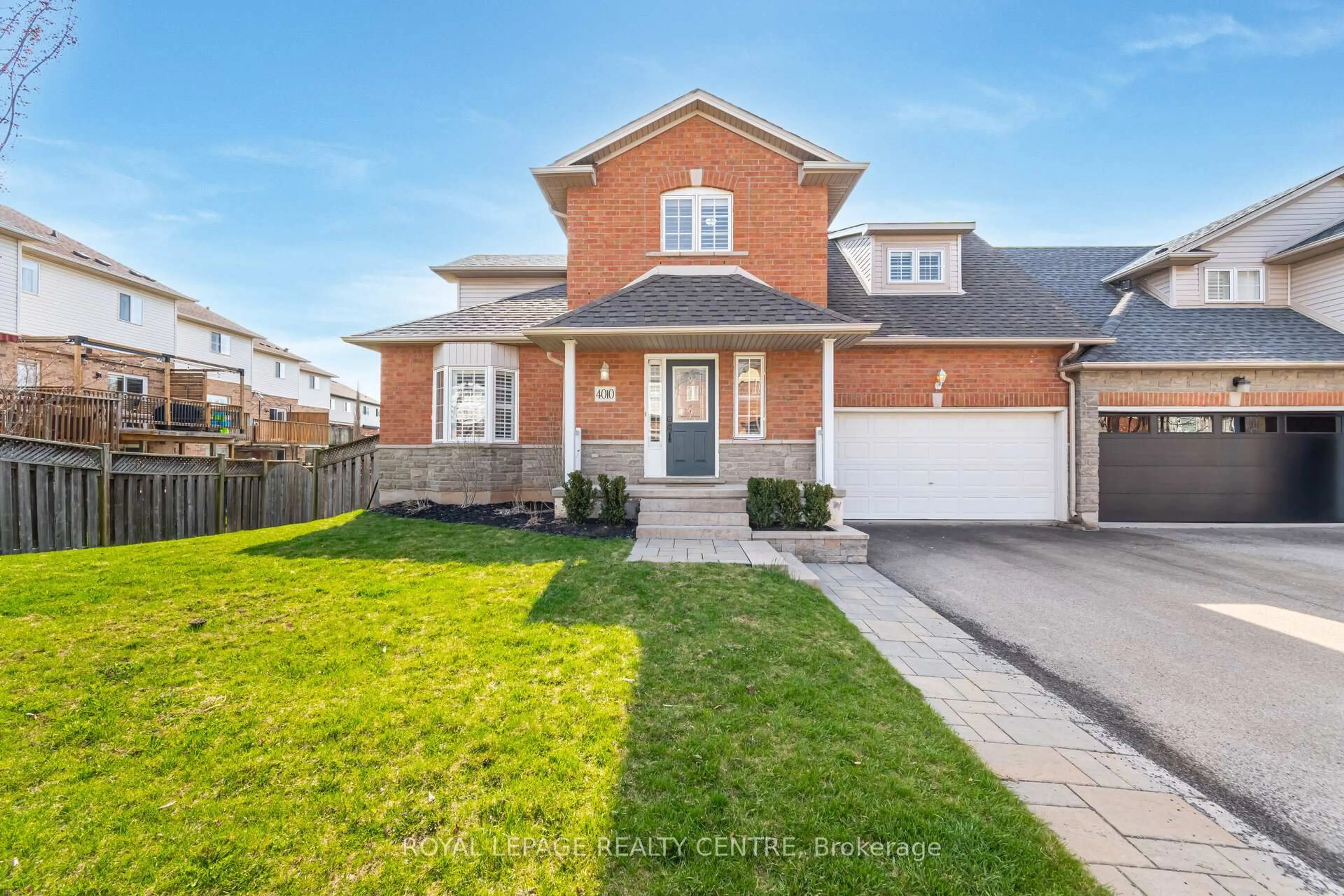 Home with brick exterior material, street for 4010 Medland Dr, Burlington Ontario L7M 4W7